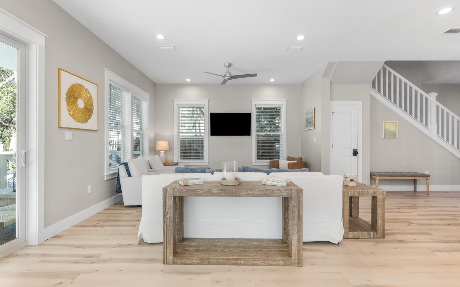 Unwind in your bright, airy living space with modern coastal charm and natural wood accents that create the perfect retreat.