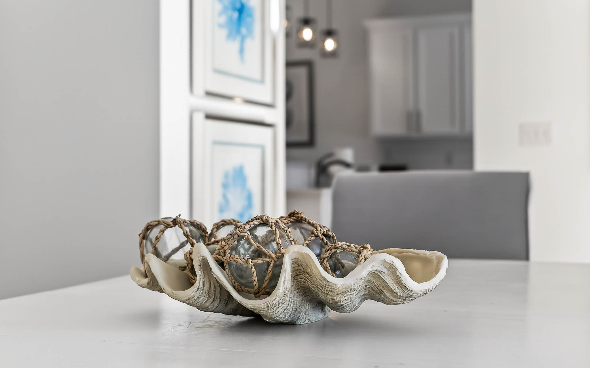 You'll love the elegant touches throughout this bright, modern space with its sleek kitchen and thoughtful coastal-inspired decor.