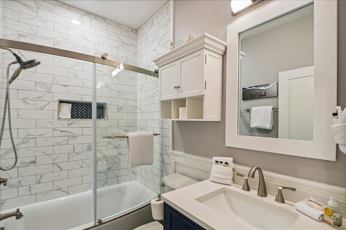 1st Floor Guest Bathroom - Featuring a Walk-in Shower