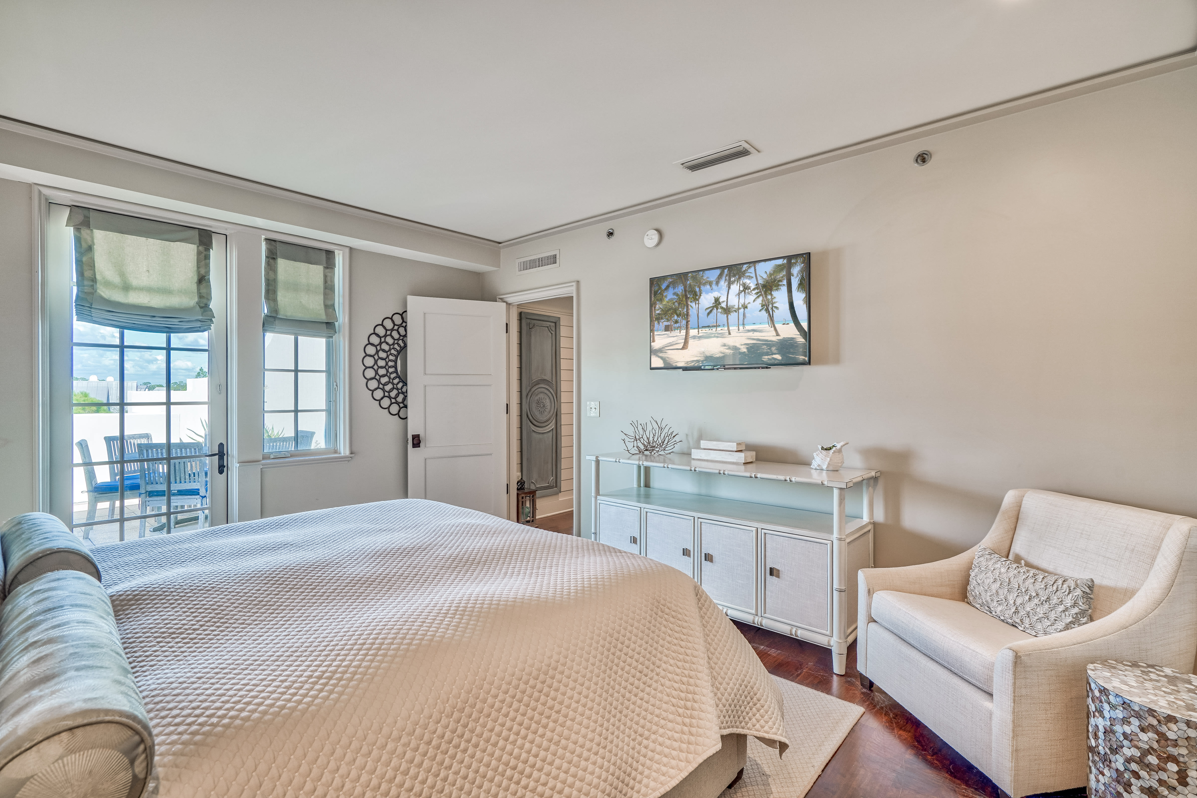 Primary Suite - Providing Private Access to the Spacious Balcony