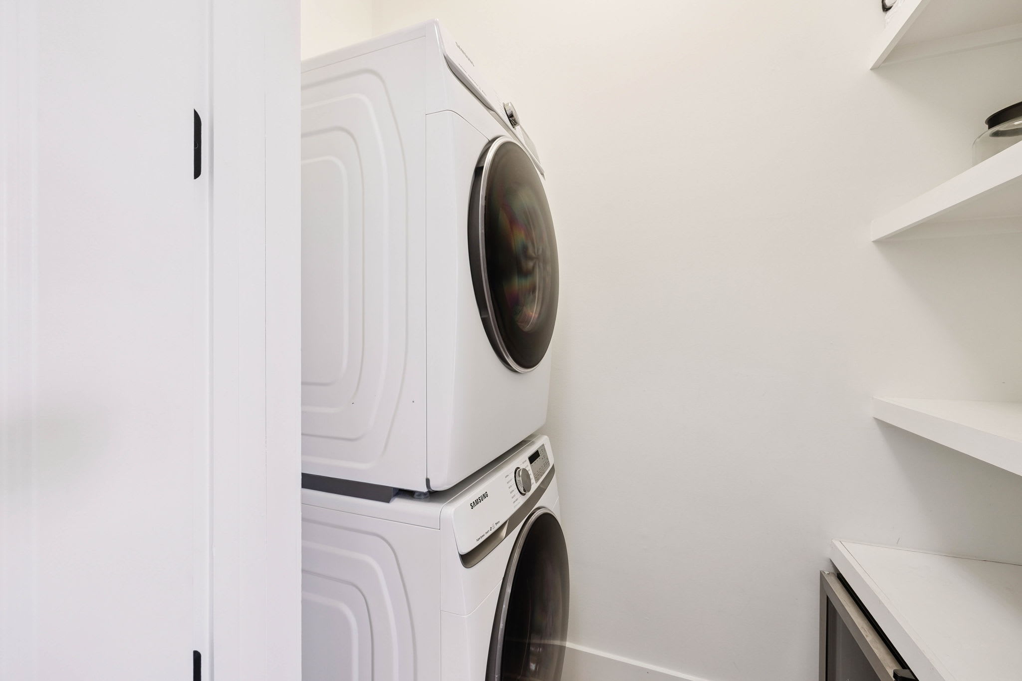 Stack Washer & Dryer + Mini Fridge in the Laundry Room