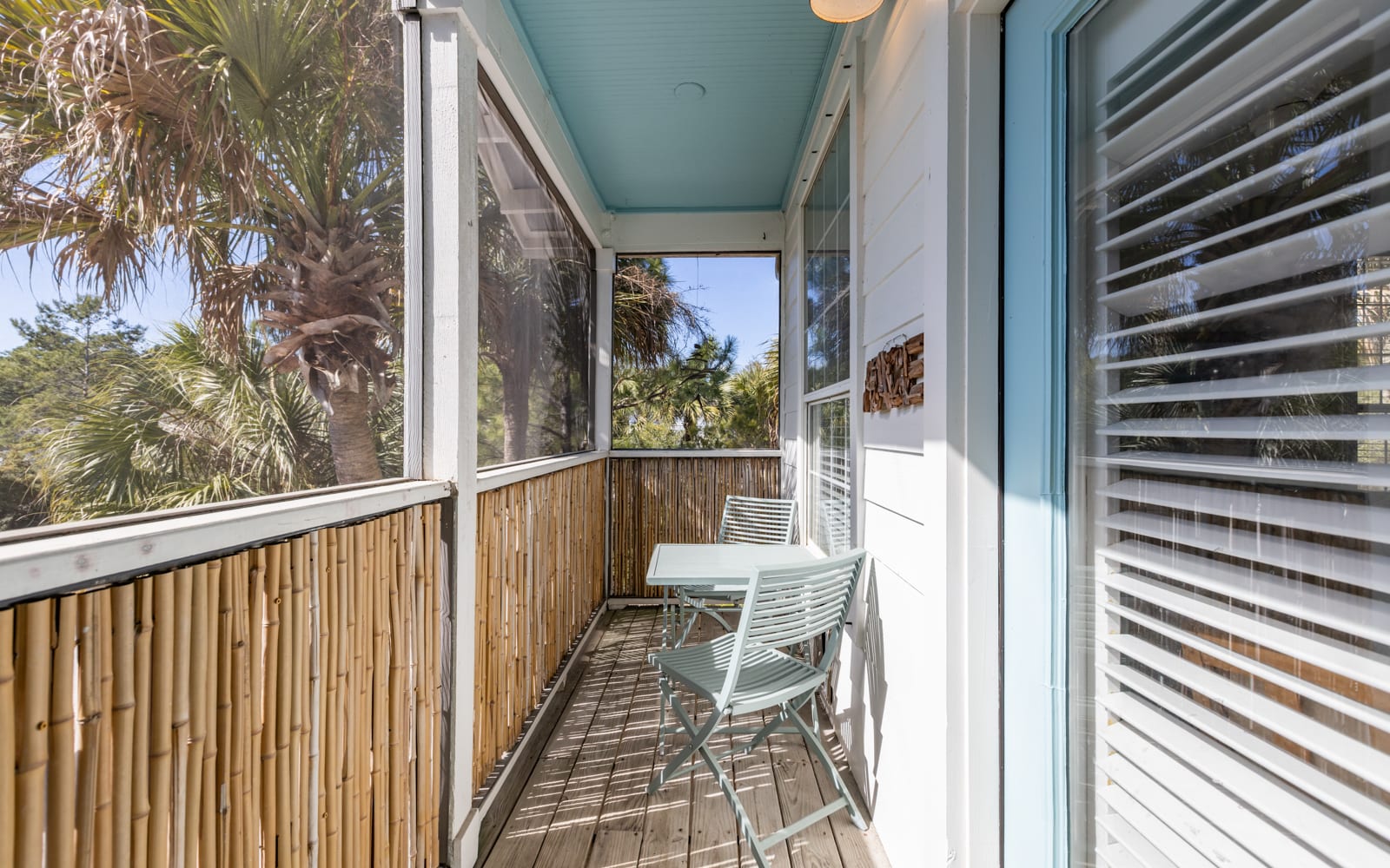 Step out onto your private screened balcony and breathe in the tropical breeze while relaxing in your peaceful outdoor retreat.