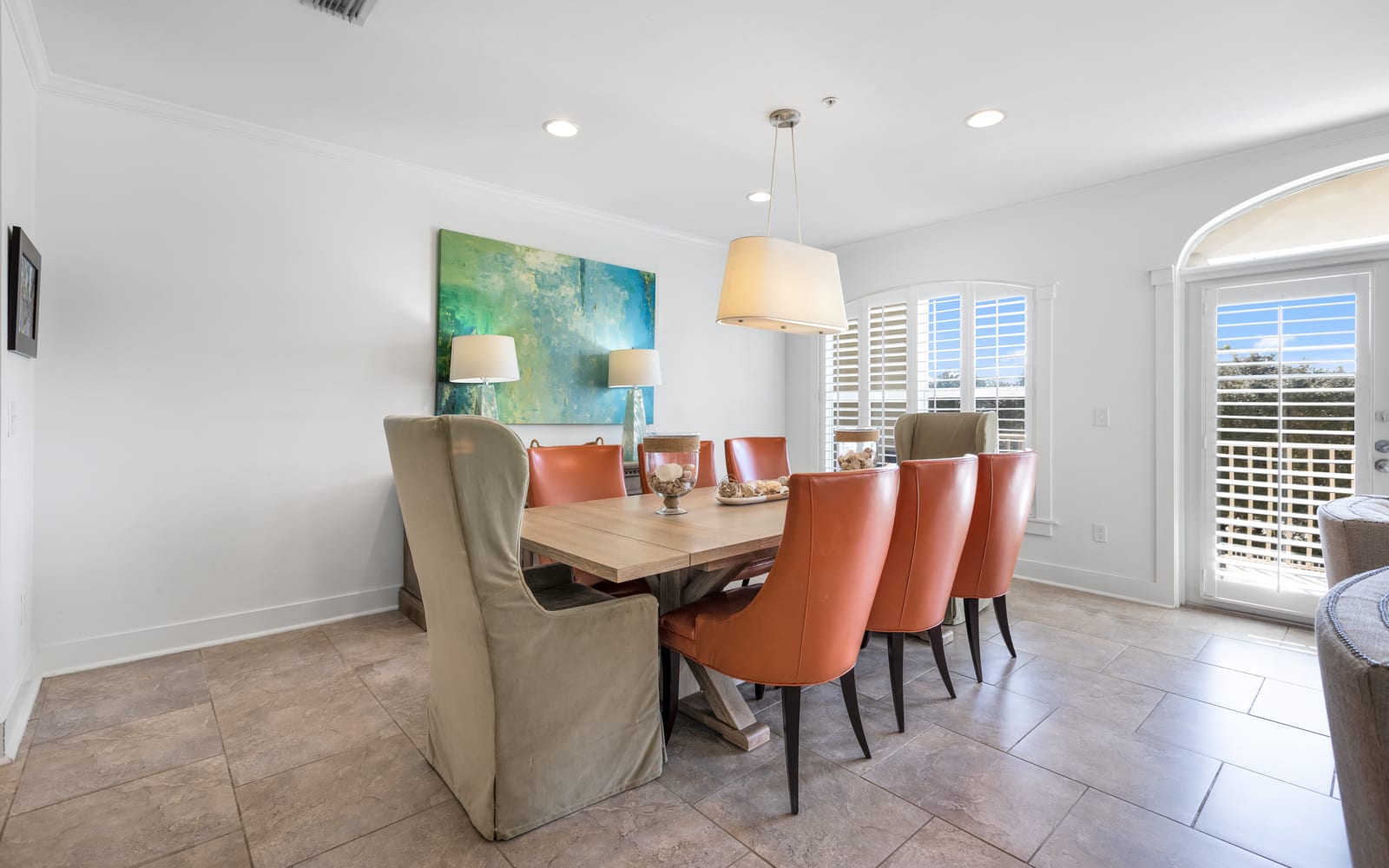 Gather around your elegant dining table for memorable meals together. Stylish chairs and warm lighting create the perfect atmosphere for every occasion.