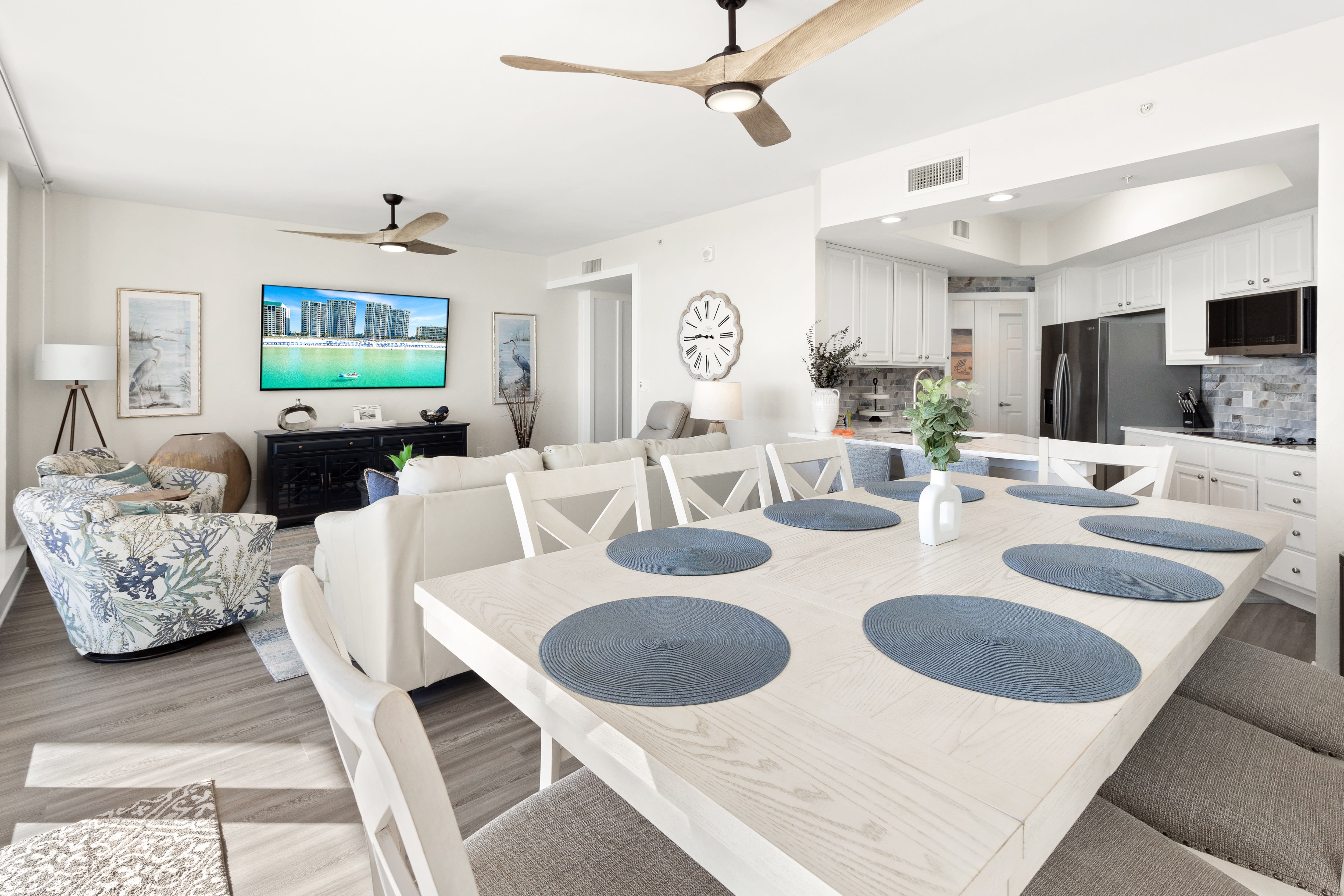 Relax in this elegant open-plan space where dining and living flow seamlessly together, creating the perfect setting for memorable gatherings.