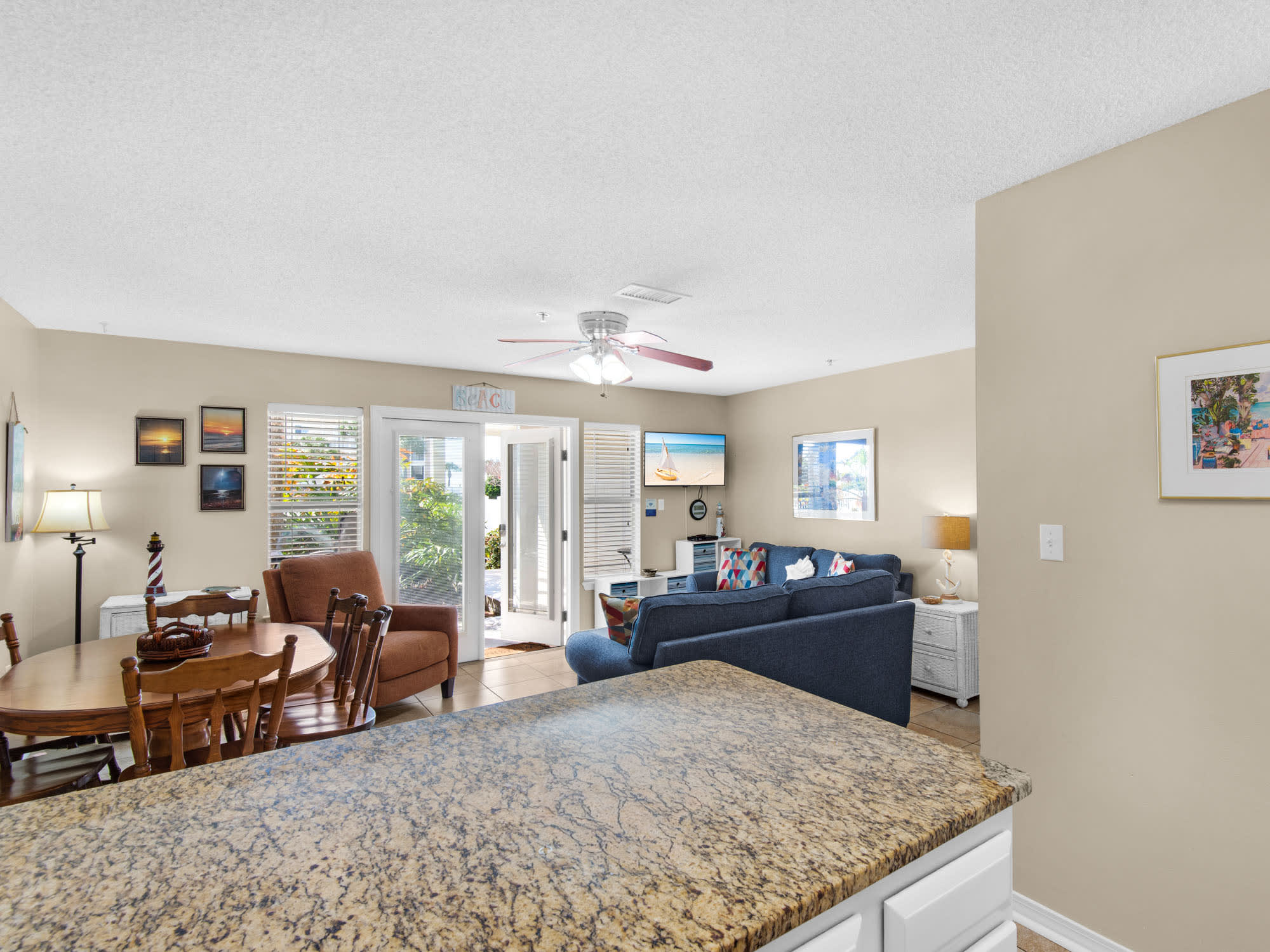 Open-concept living space where kitchen, dining, and lounge areas flow seamlessly together for memorable vacation moments.