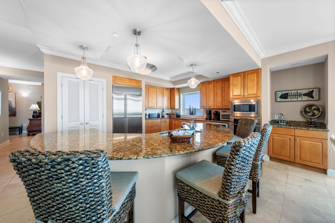 Gather around your spacious granite island where cooking becomes a shared experience, with premium appliances and coastal charm throughout.