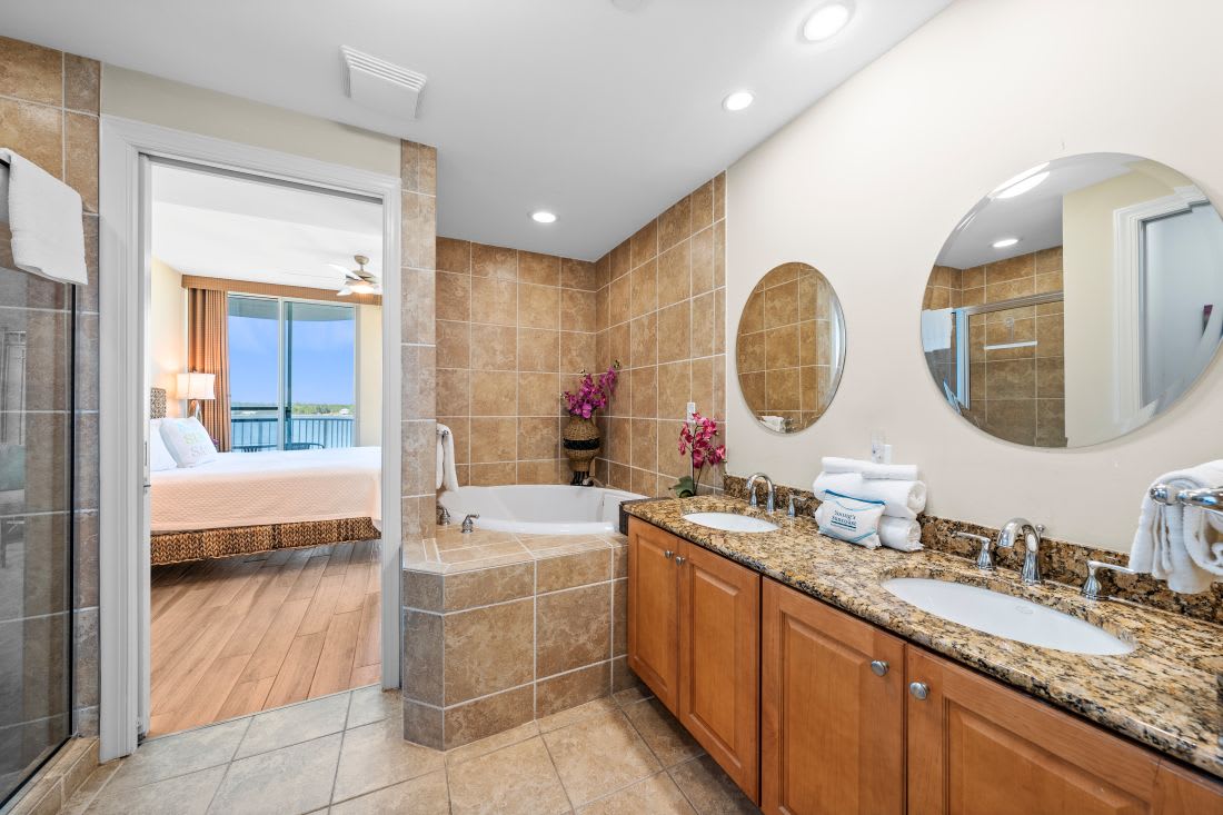 Unwind in your luxurious master bathroom with dual vanities, granite countertops, and a relaxing soaking tub perfect for evening bubble baths.
