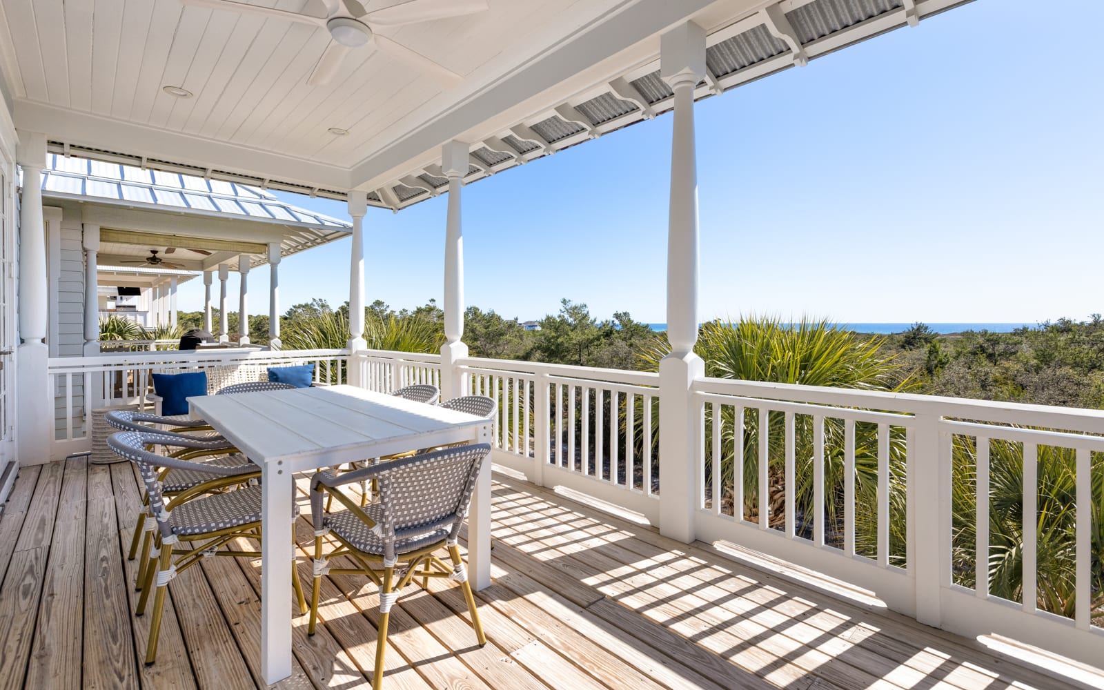 Your oceanview deck awaits with comfortable dining space and tropical breezes, perfect for morning coffee or sunset dinners.