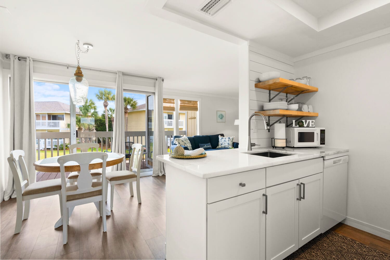 Your bright, open kitchen flows seamlessly into the dining and living areas, creating the perfect space for memorable meals together.