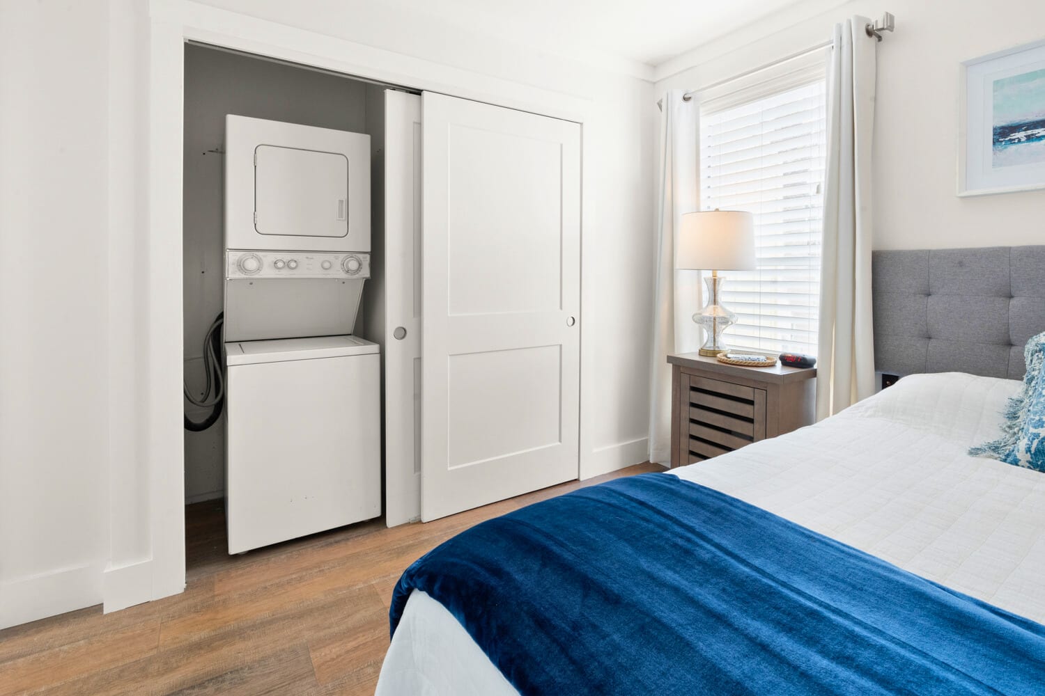 Your bright bedroom features convenient in-room laundry facilities, making longer stays effortless and comfortable.