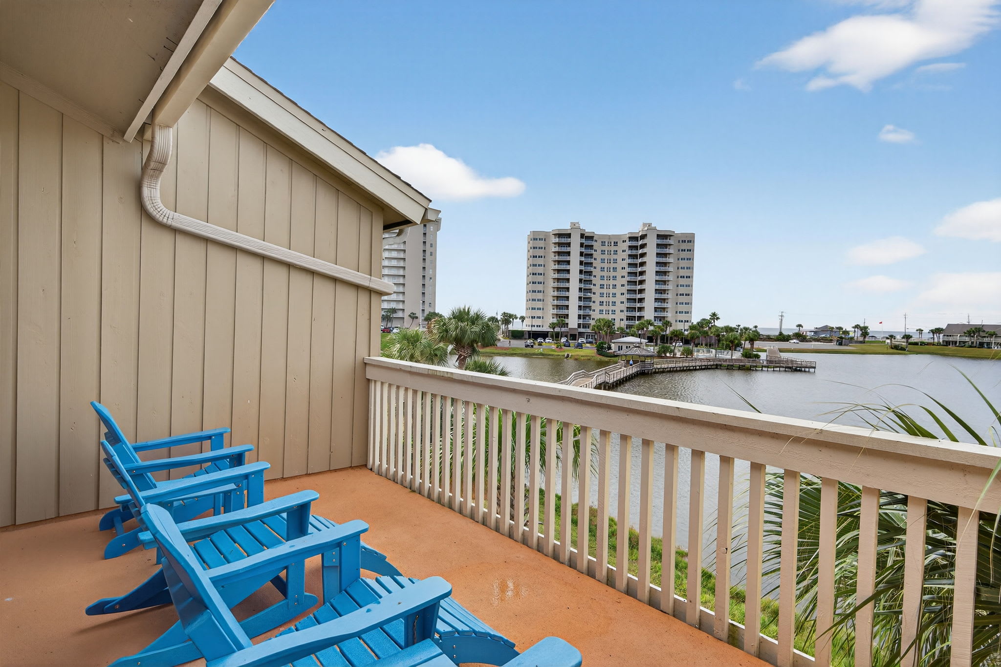 Settle into your private balcony with comfortable seating and enjoy peaceful water views perfect for morning coffee or evening relaxation.