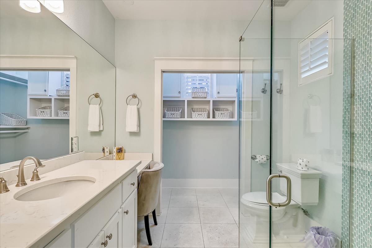 1st Floor Primary En Suite - Equipped with a Single Vanity & Make Up Station.