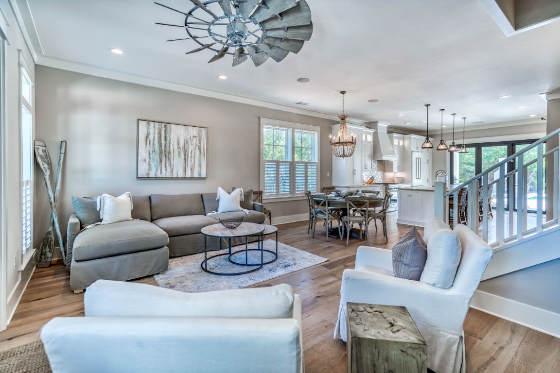 Living Room - Furnished with a Plush New Sofa and Swivel Chairs