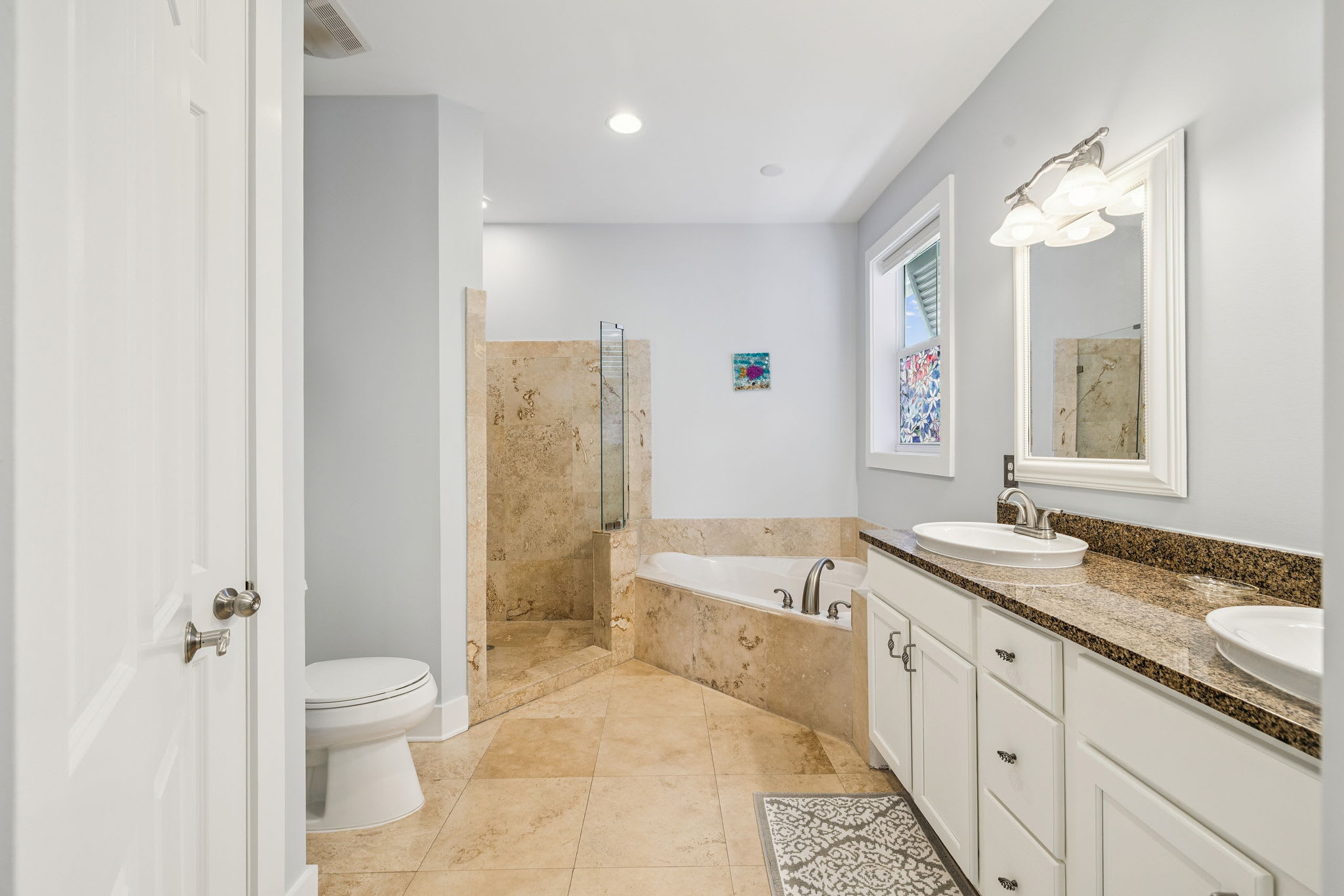 Primary King En-Suite - Oversized Soaking Tub + Walk-In Shower