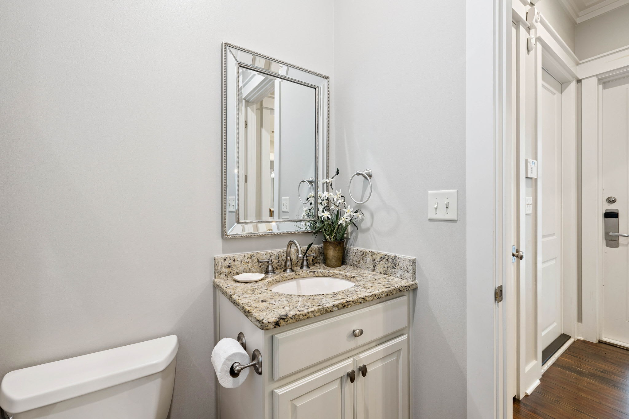 Powder Room - Conveniently Located off the Kitchen