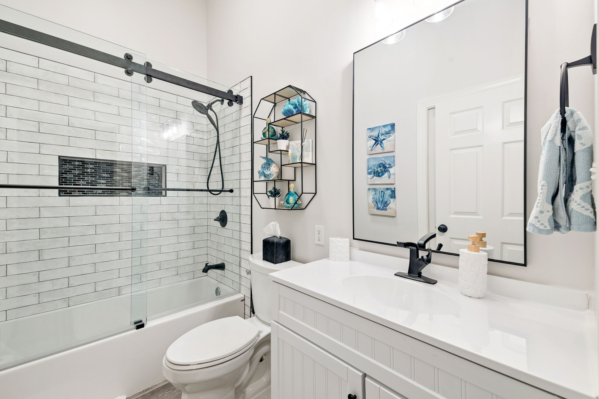 Shared Guest Bathroom - Single Vanity + Shower/Tub Combo