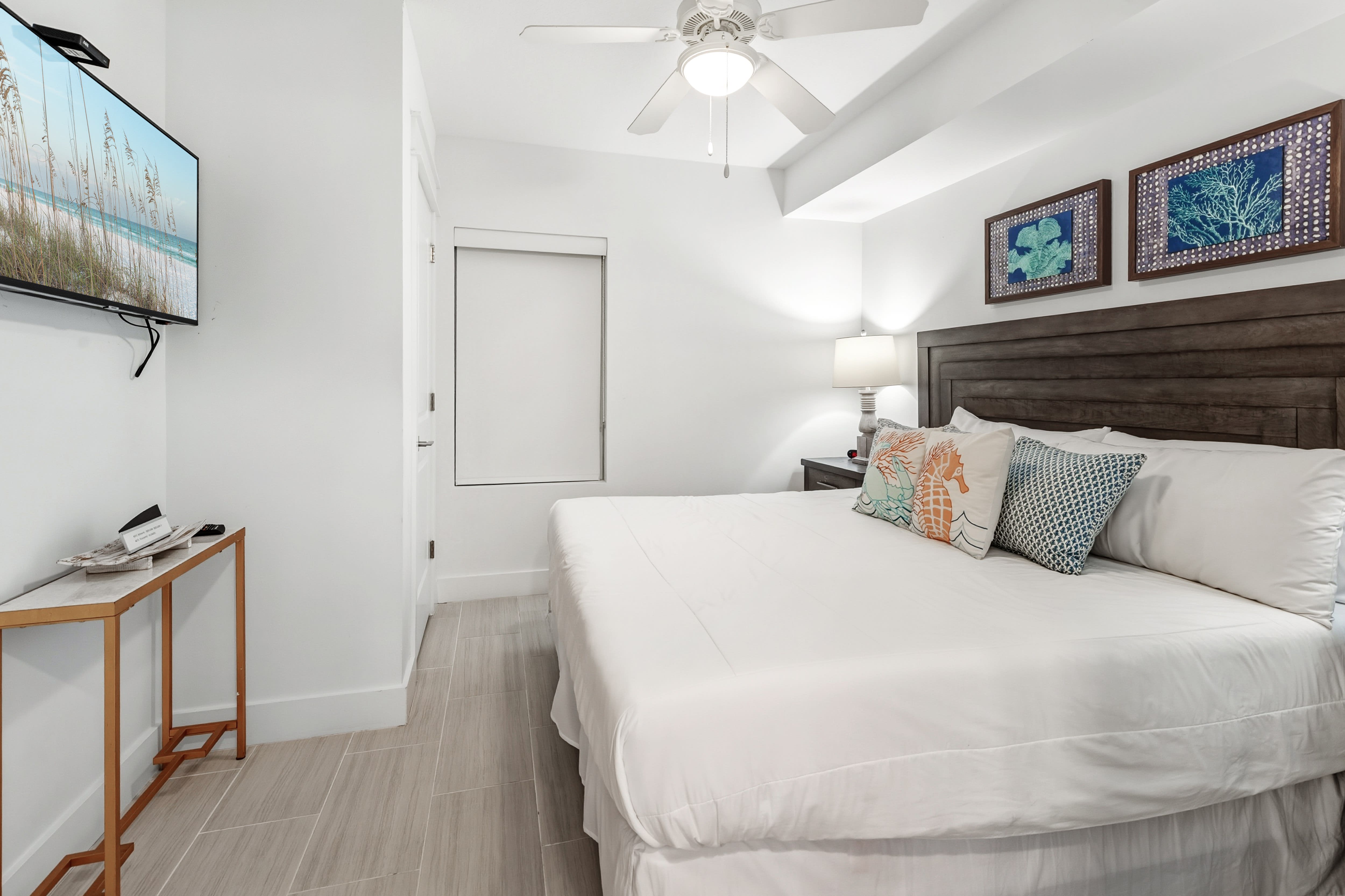 Sink into this cozy bedroom where coastal charm meets comfort—your peaceful retreat with thoughtful touches and modern amenities.