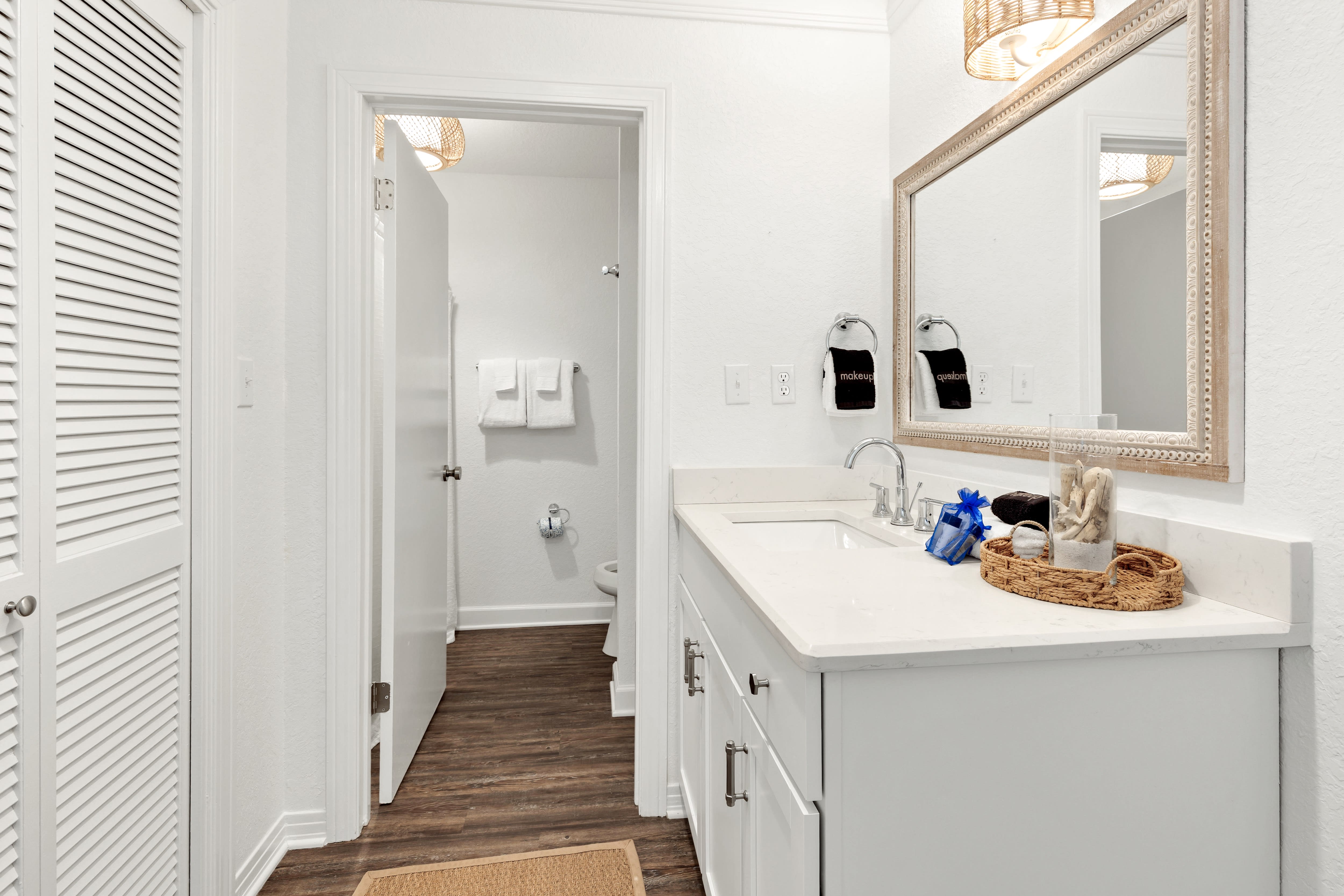 Freshen up in your bright bathroom with vanity counter space, thoughtful amenities, and a tub-shower combo for unwinding.