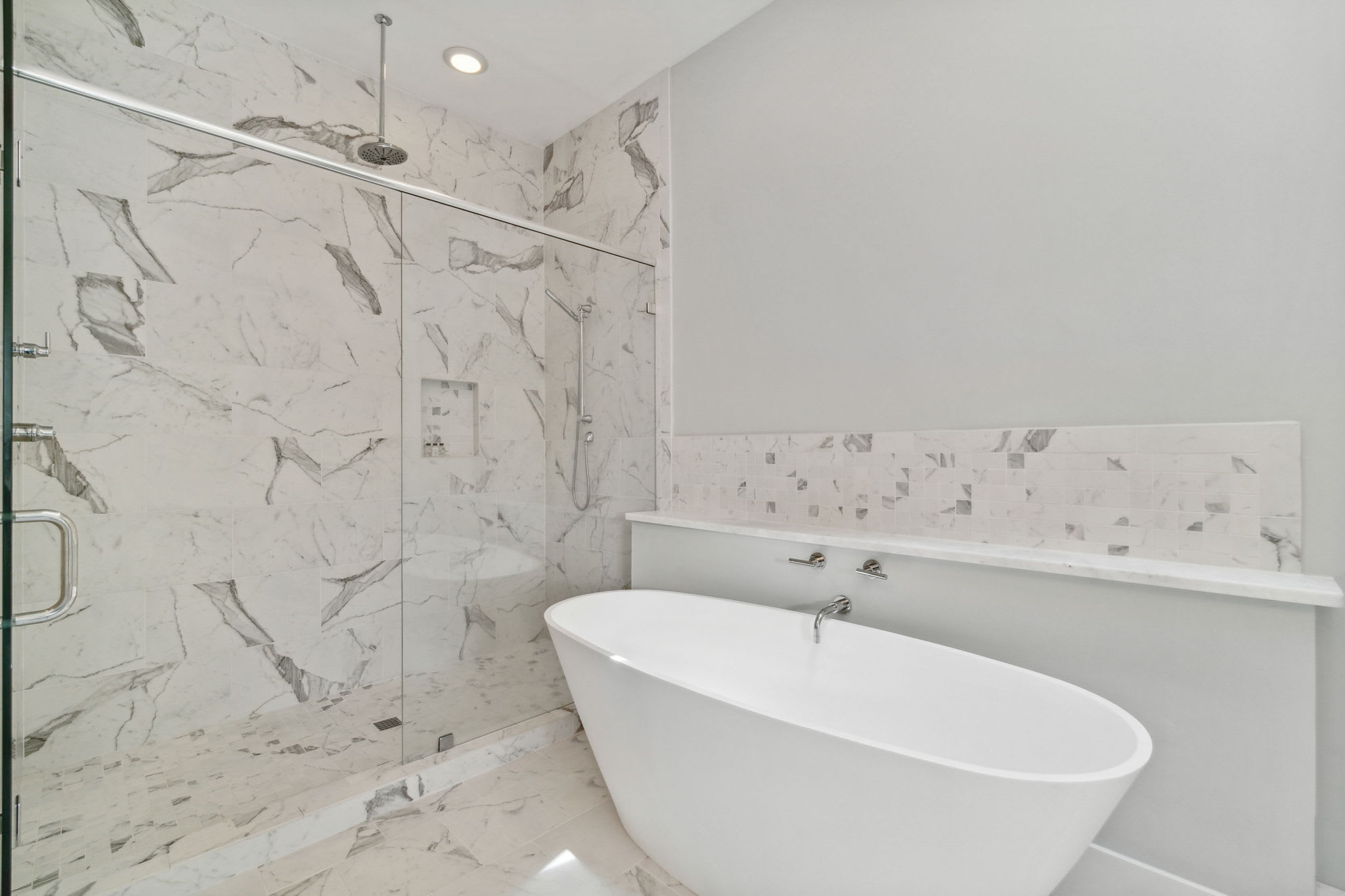 Enjoy the Walk-In Shower or Soaking Tub in the Primary En-Suite