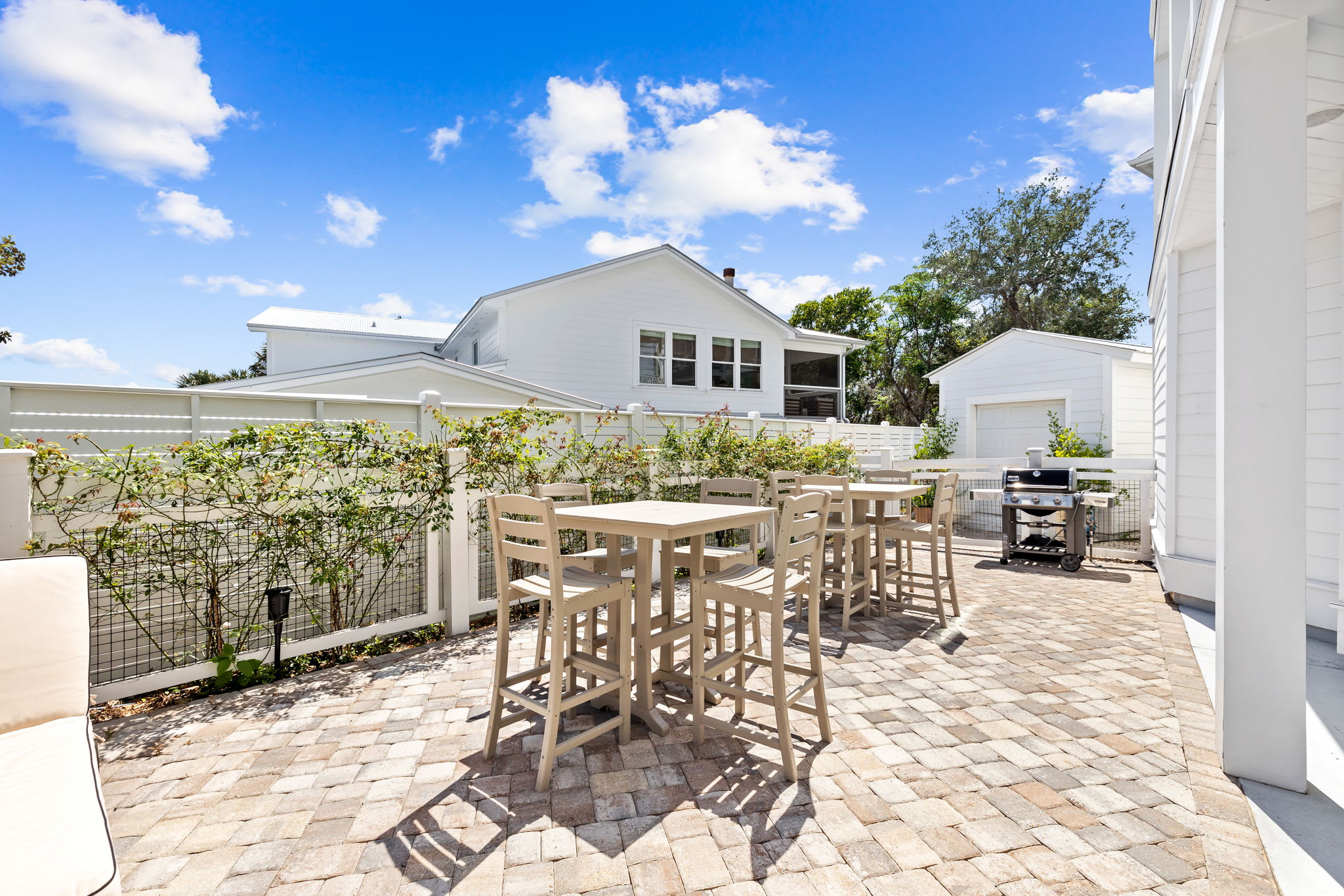 Enjoy al fresco meals with a gas grill and patio TV.