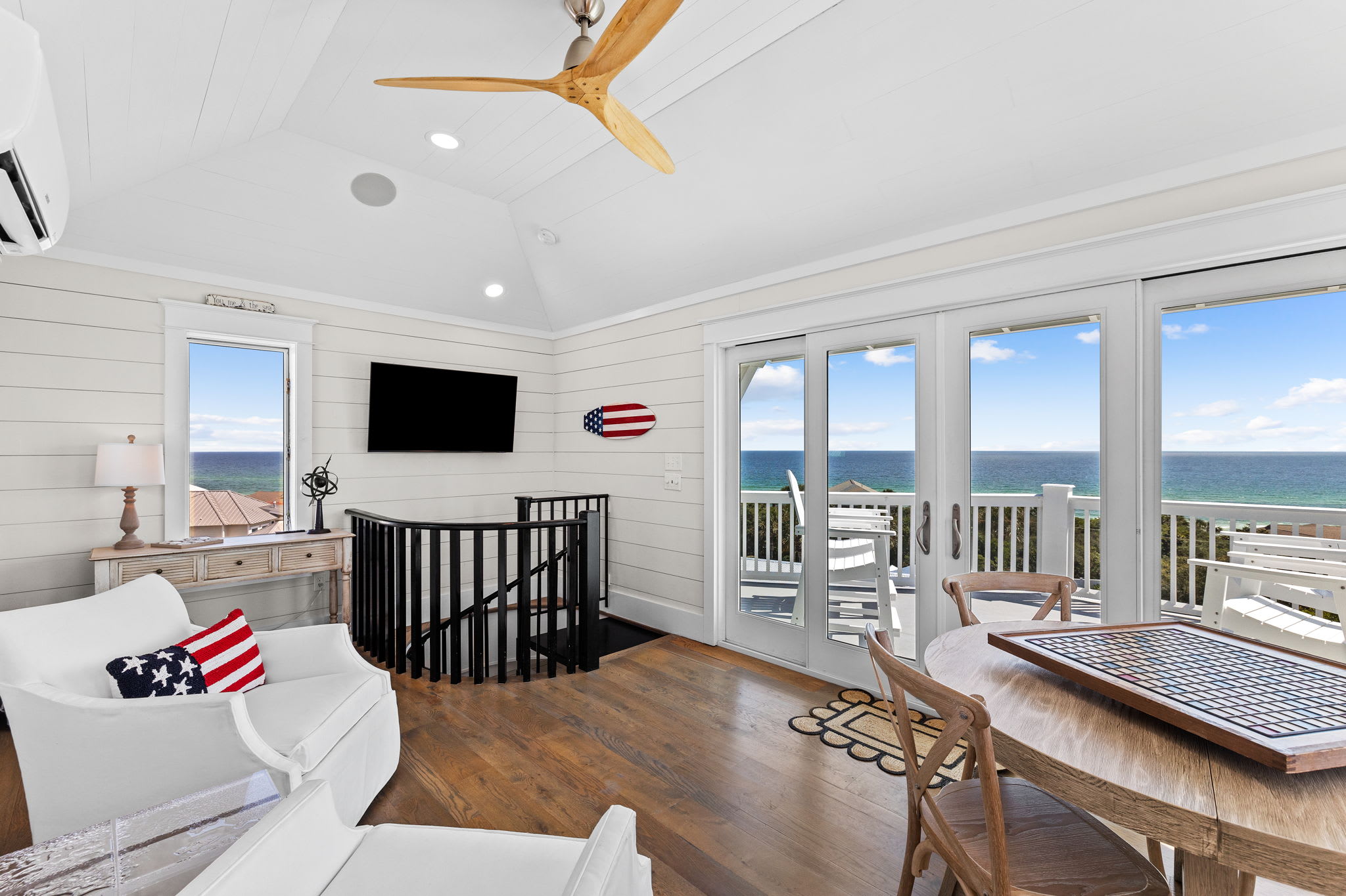 Game table, mini fridge, Smart TV, and unbeatable sunset views.