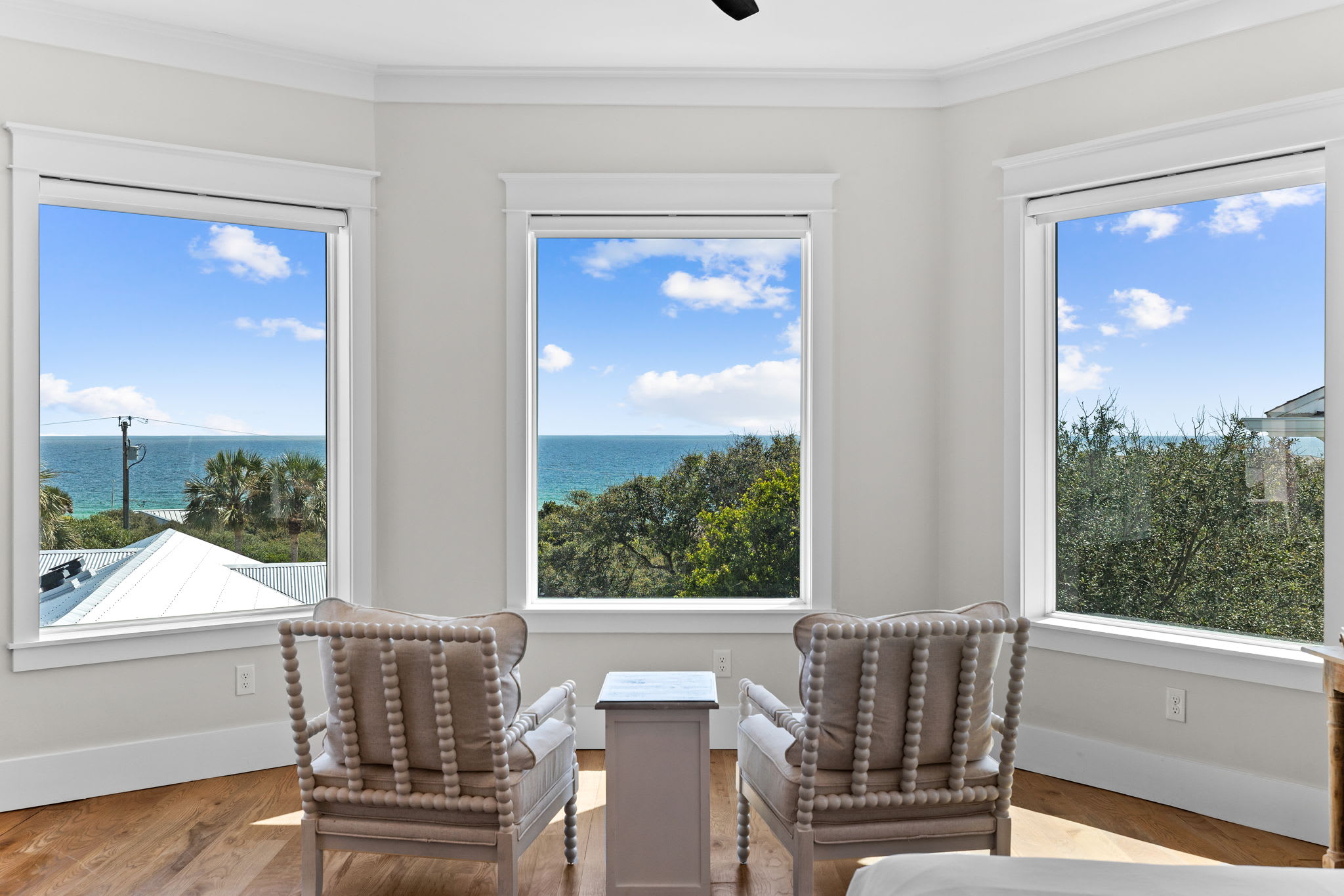 Comfortable seating and breathtaking views from the primary king suite