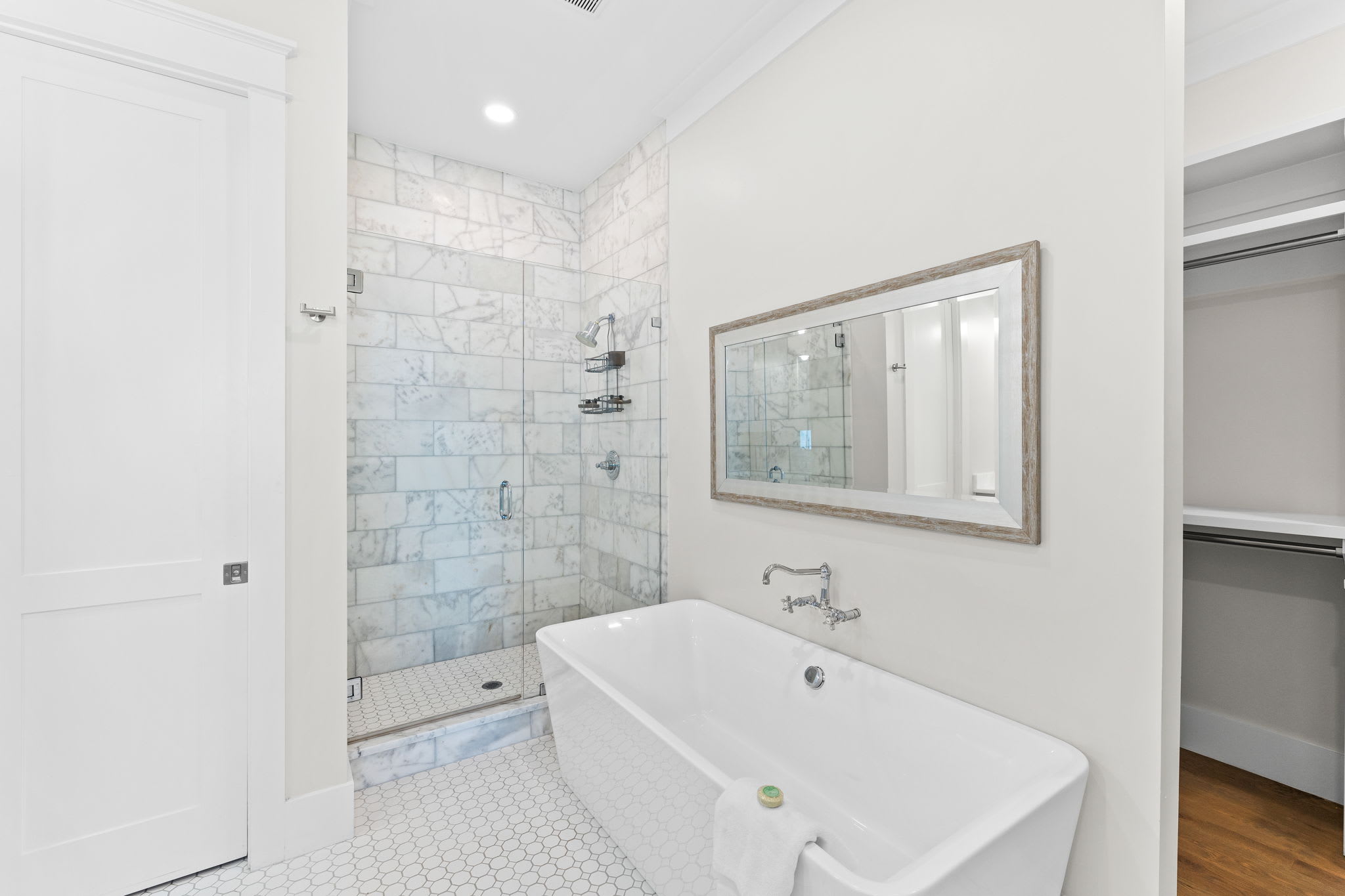 Enjoy the Soaking Tub & Walk-In Shower in the Primary En-Suite