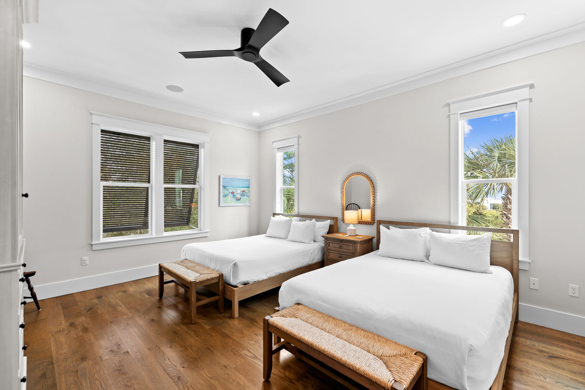 Double Queen Suite — Two queen beds with en-suite bath and walk-in shower.