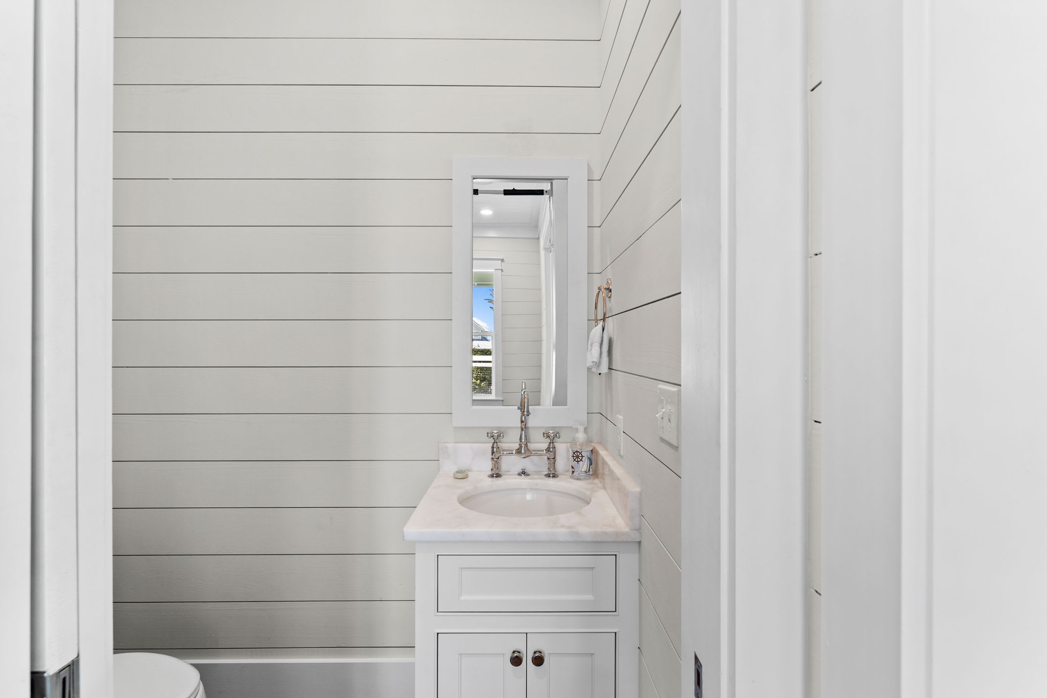 Convenient First-Floor Half Bath off Laundry Room