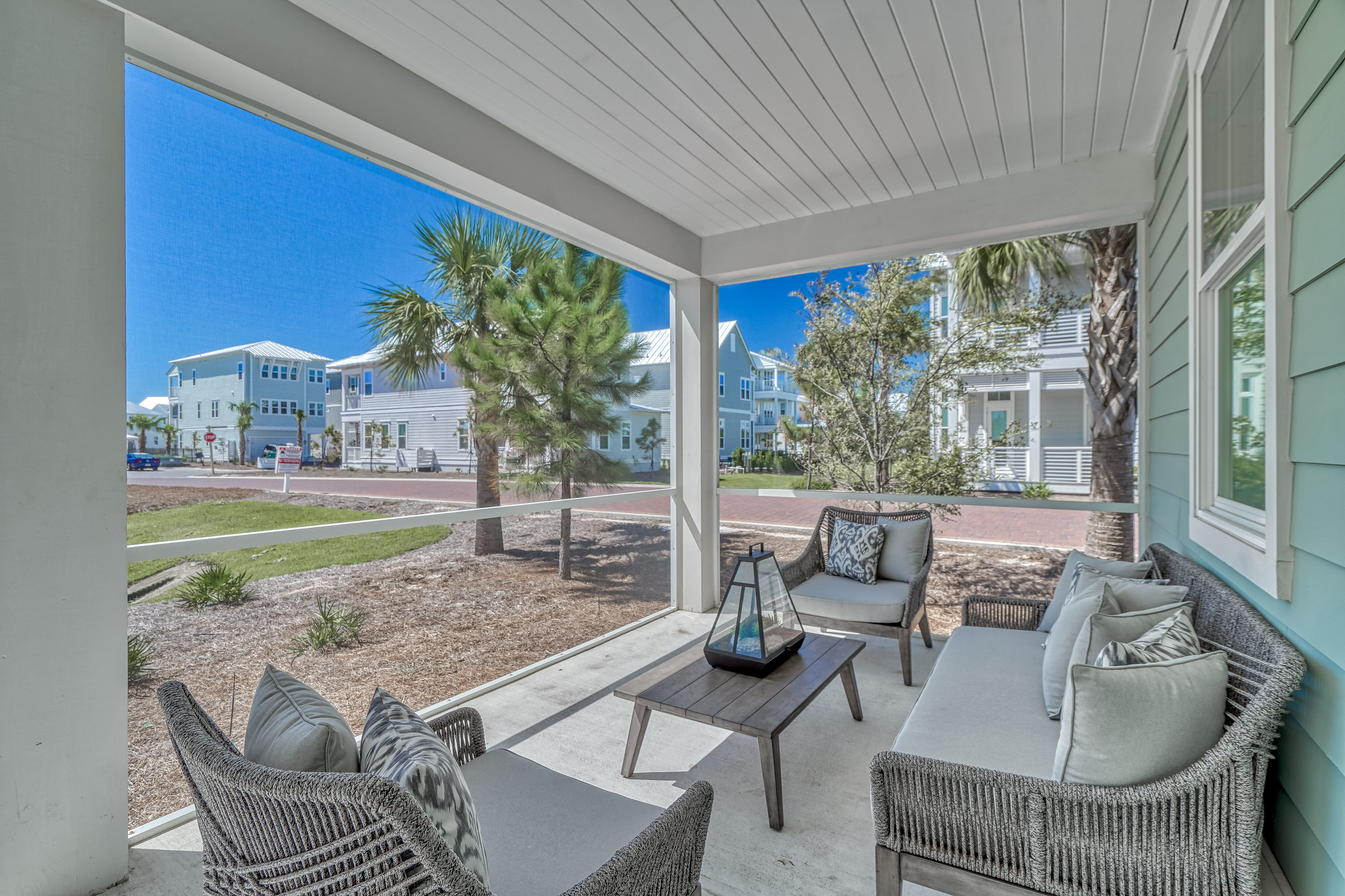 1st Floor Screened-in Porch - Furnished with Cozy Exterior Seating