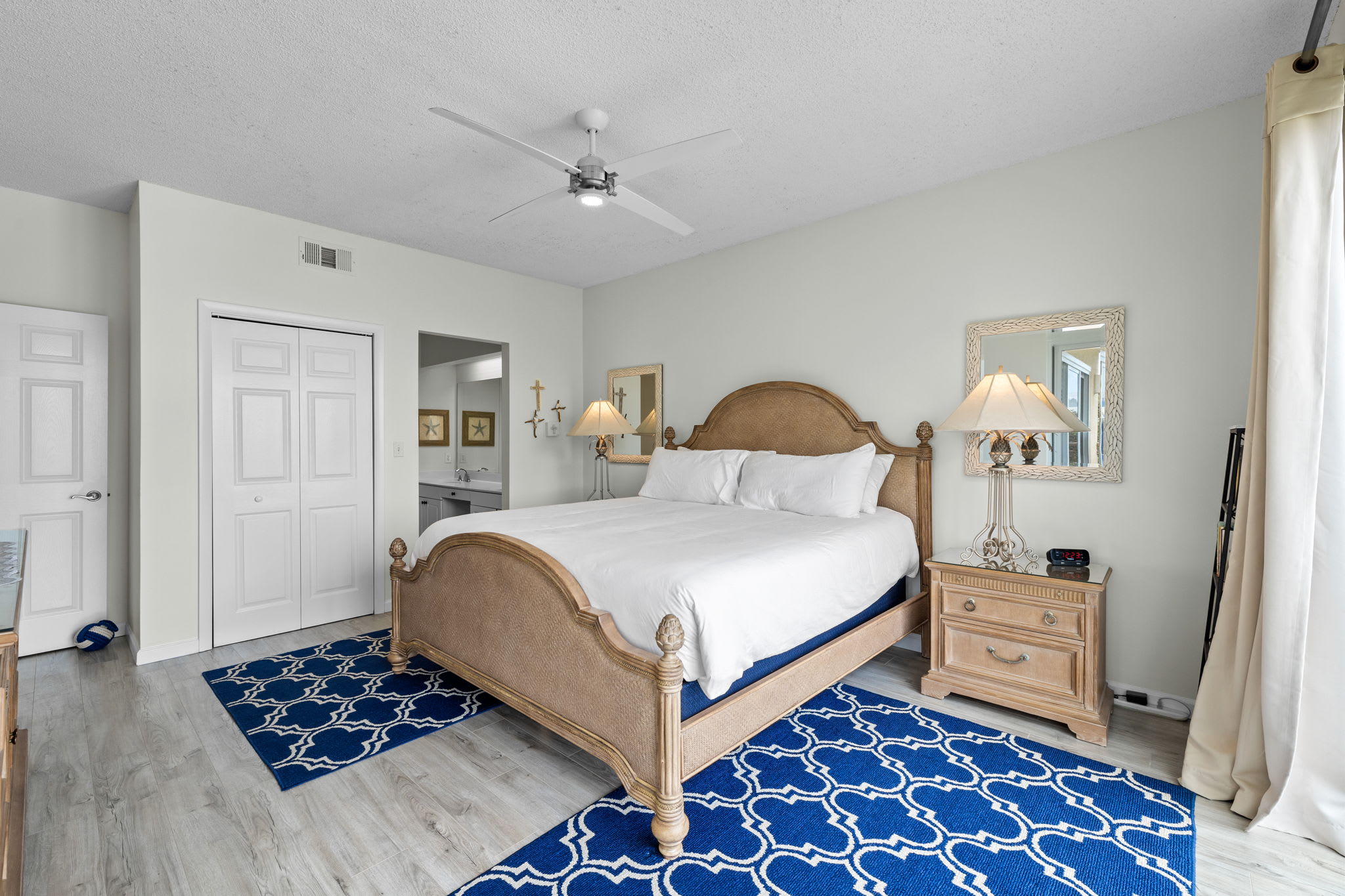 Primary Suite with King Size Bed and Balcony