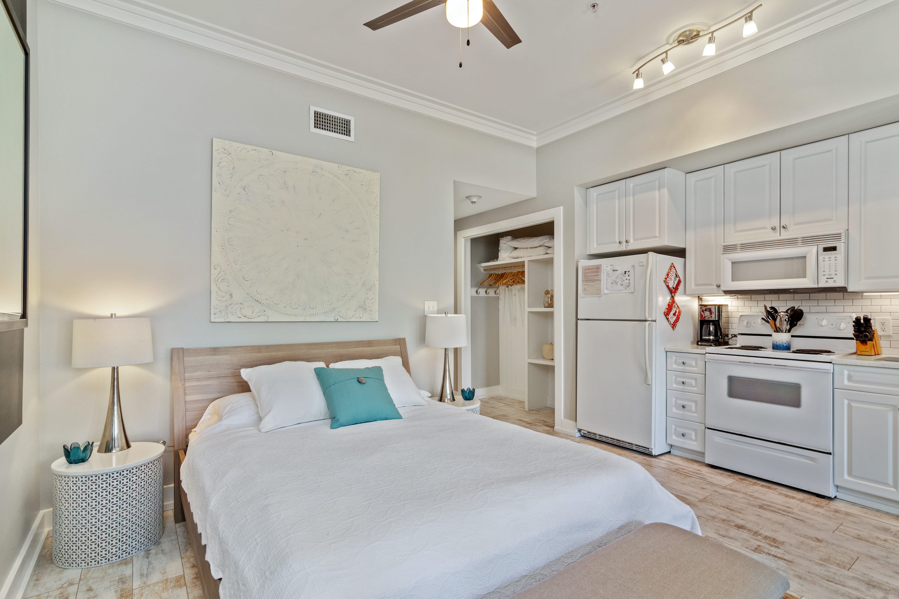 Relaxing studio layout with a plush queen bed, full kitchen, and modern coastal design—ideal for a stylish and comfortable 30A getaway.