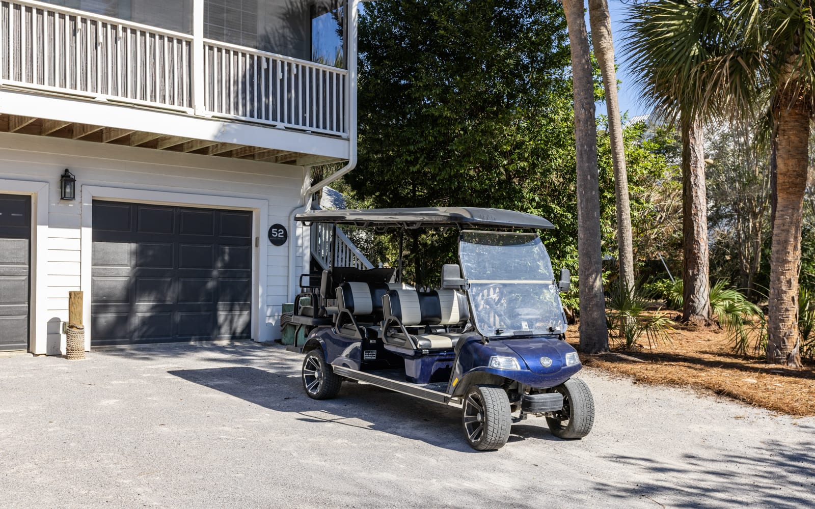Your complimentary golf cart awaits to whisk you around the property with tropical breezes and palm tree views.