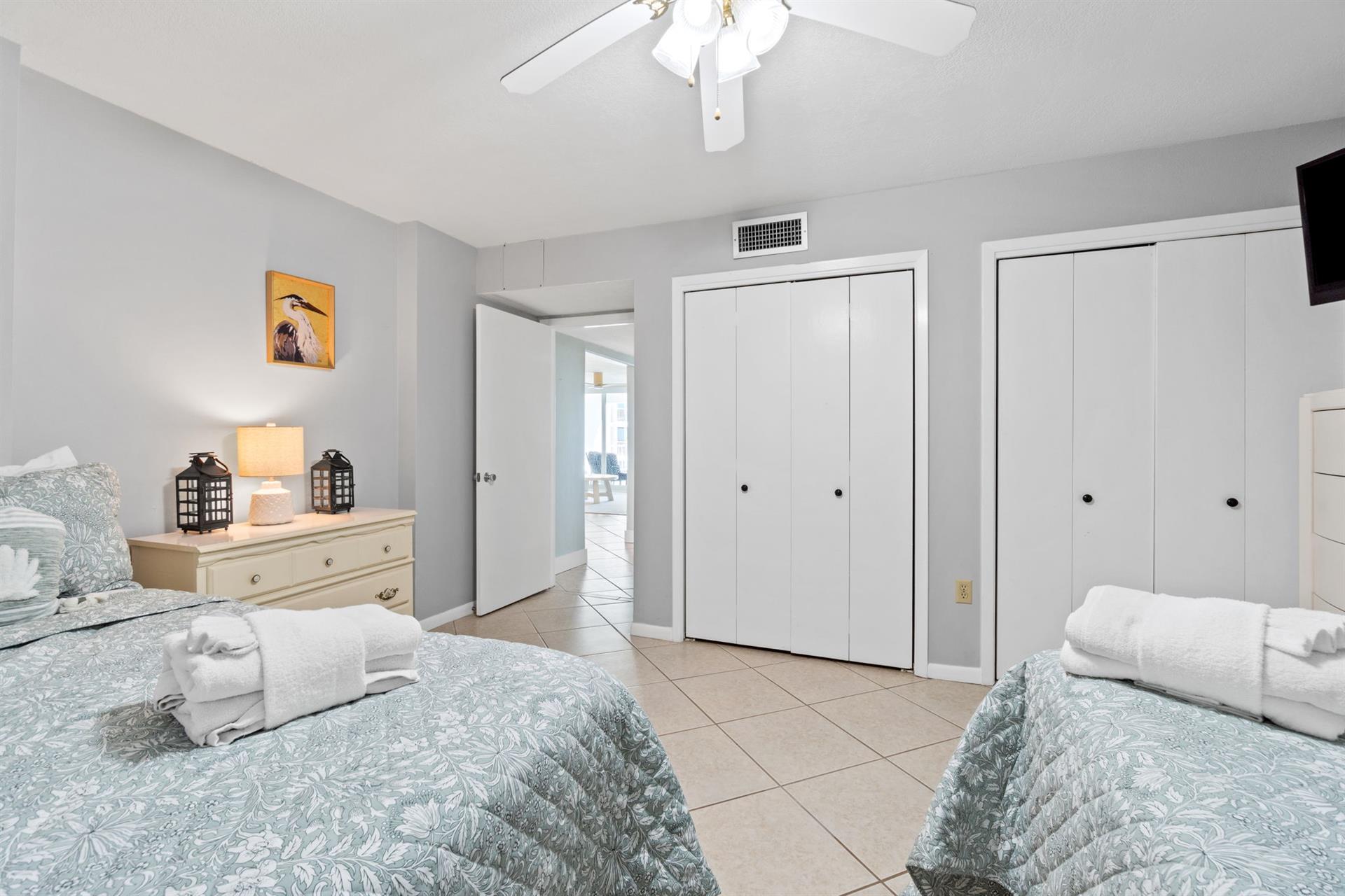 Sleep peacefully in your bright, coastal-themed twin bedroom with ceiling fan and ample closet space for your belongings.