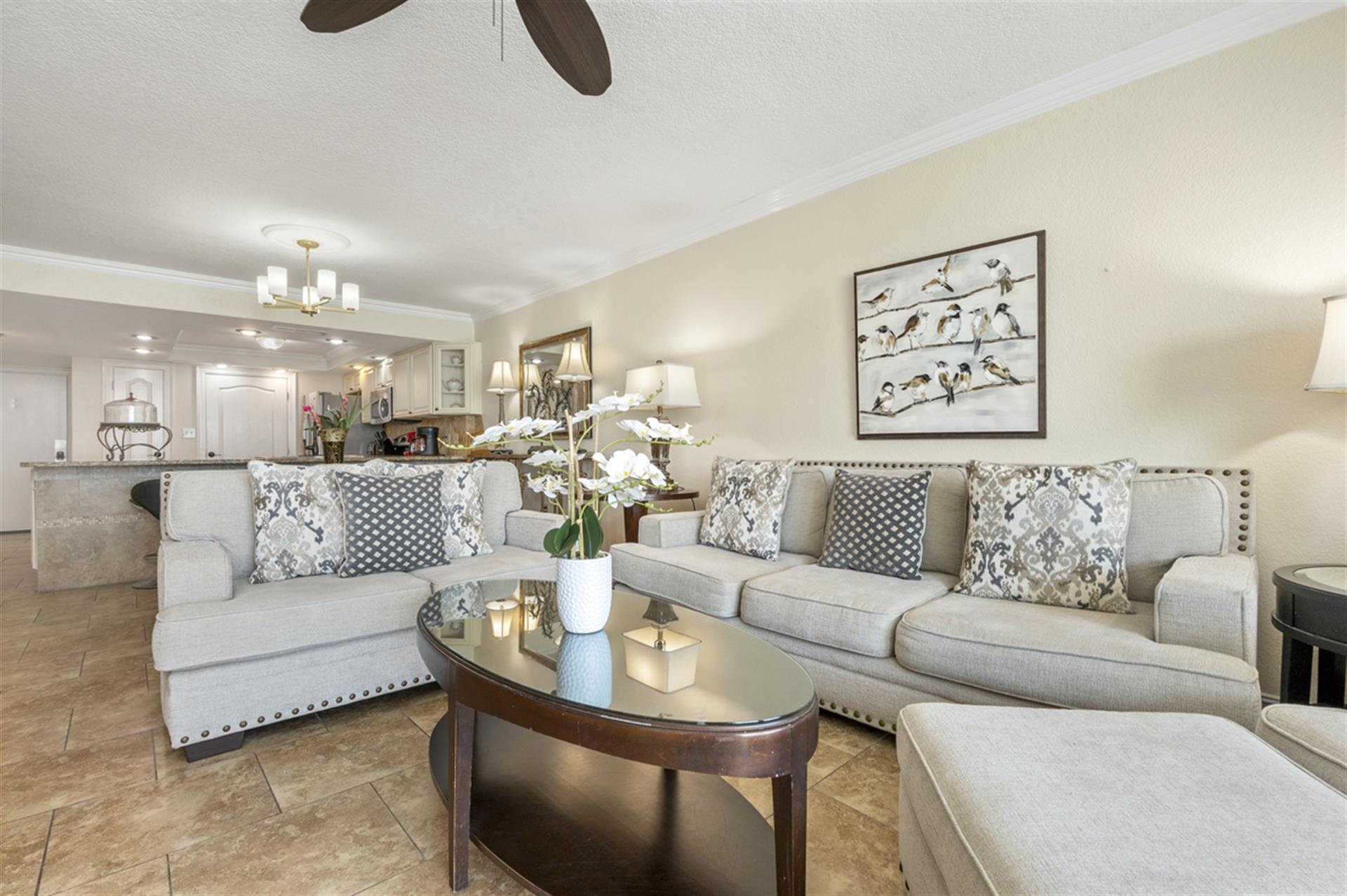 Unwind in your elegant living room where plush seating and tasteful decor create the perfect space for relaxation and conversation.