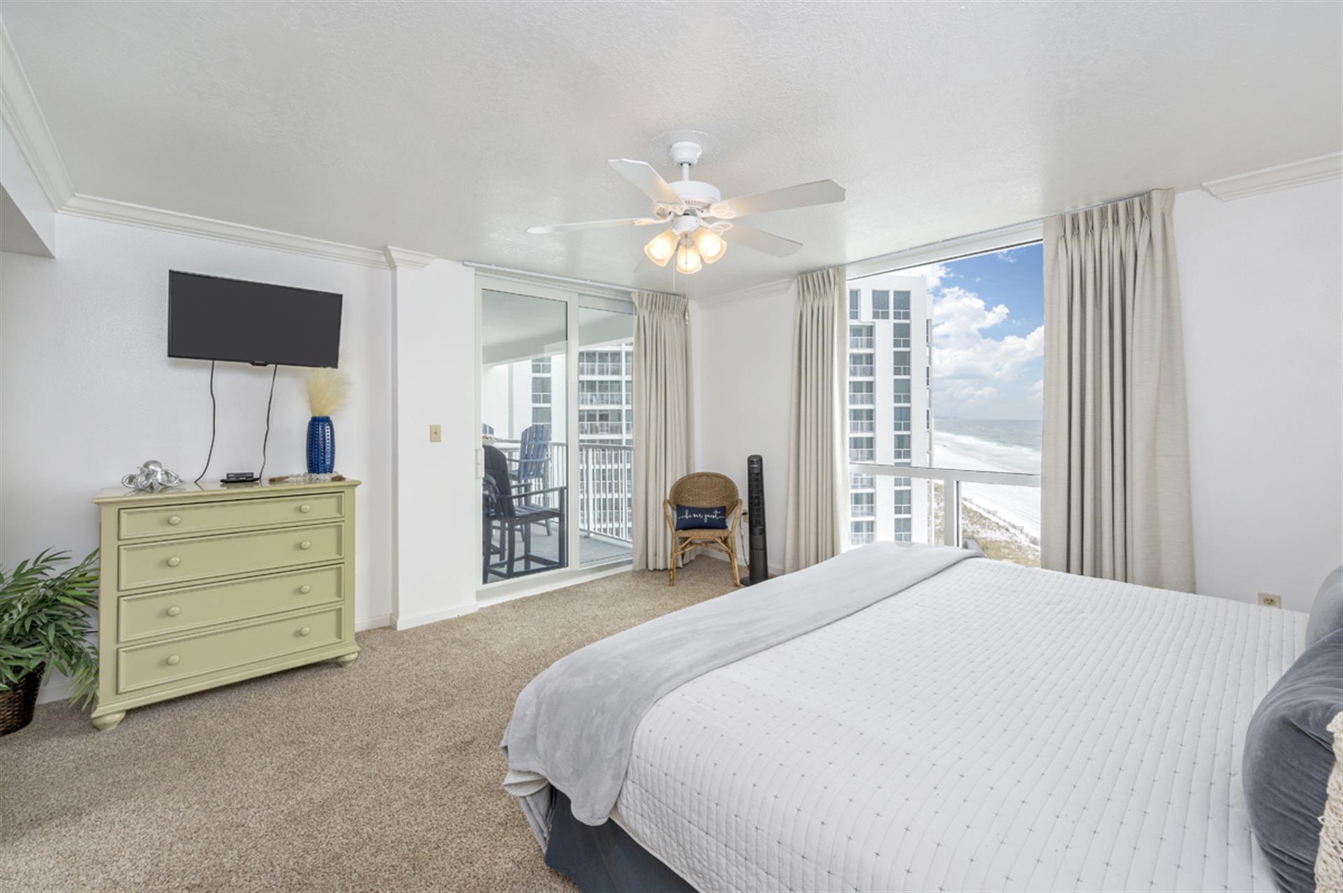 Wake up to stunning city views from your bright, comfortable bedroom. Enjoy fresh ocean breezes on your private balcony after a restful night.
