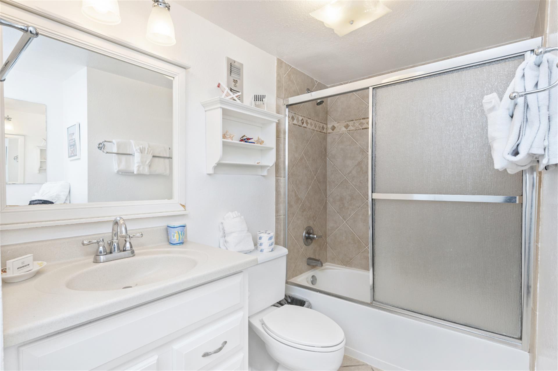 Refresh in your bright, clean bathroom featuring a tub-shower combo and plenty of space to prepare for your day.