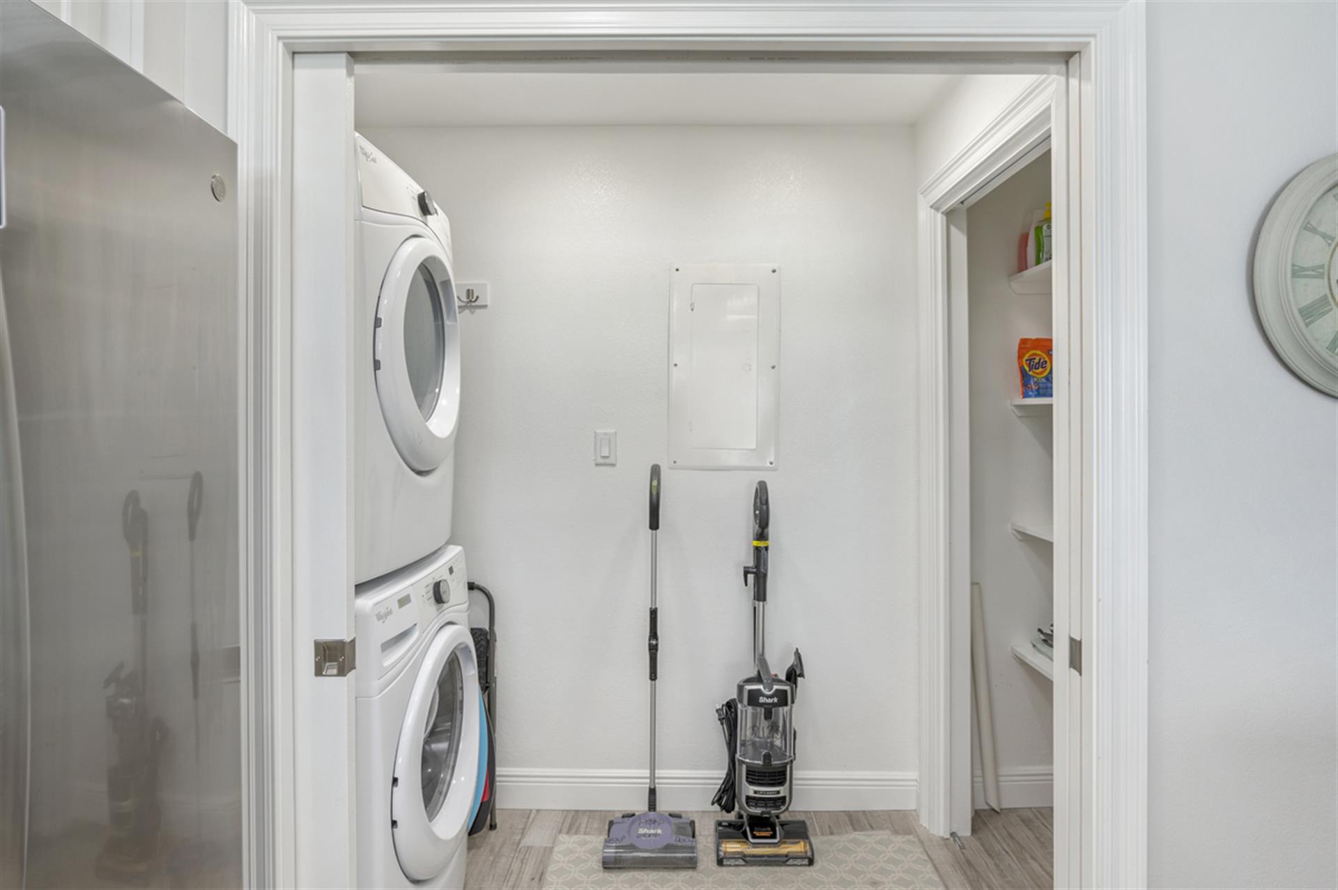 Your private laundry room keeps your stay comfortable with full-size washer and dryer, plus storage for all your cleaning needs.