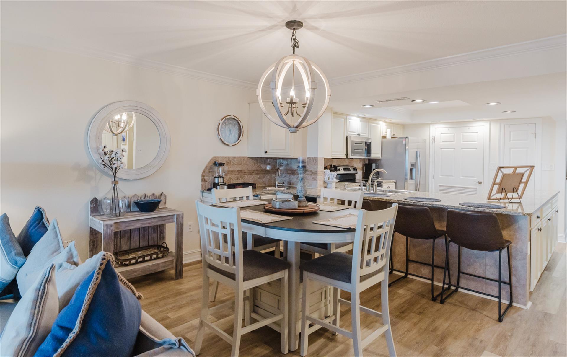 Gather around your stylish dining table or chat at the kitchen island in this beautifully designed open-concept space.