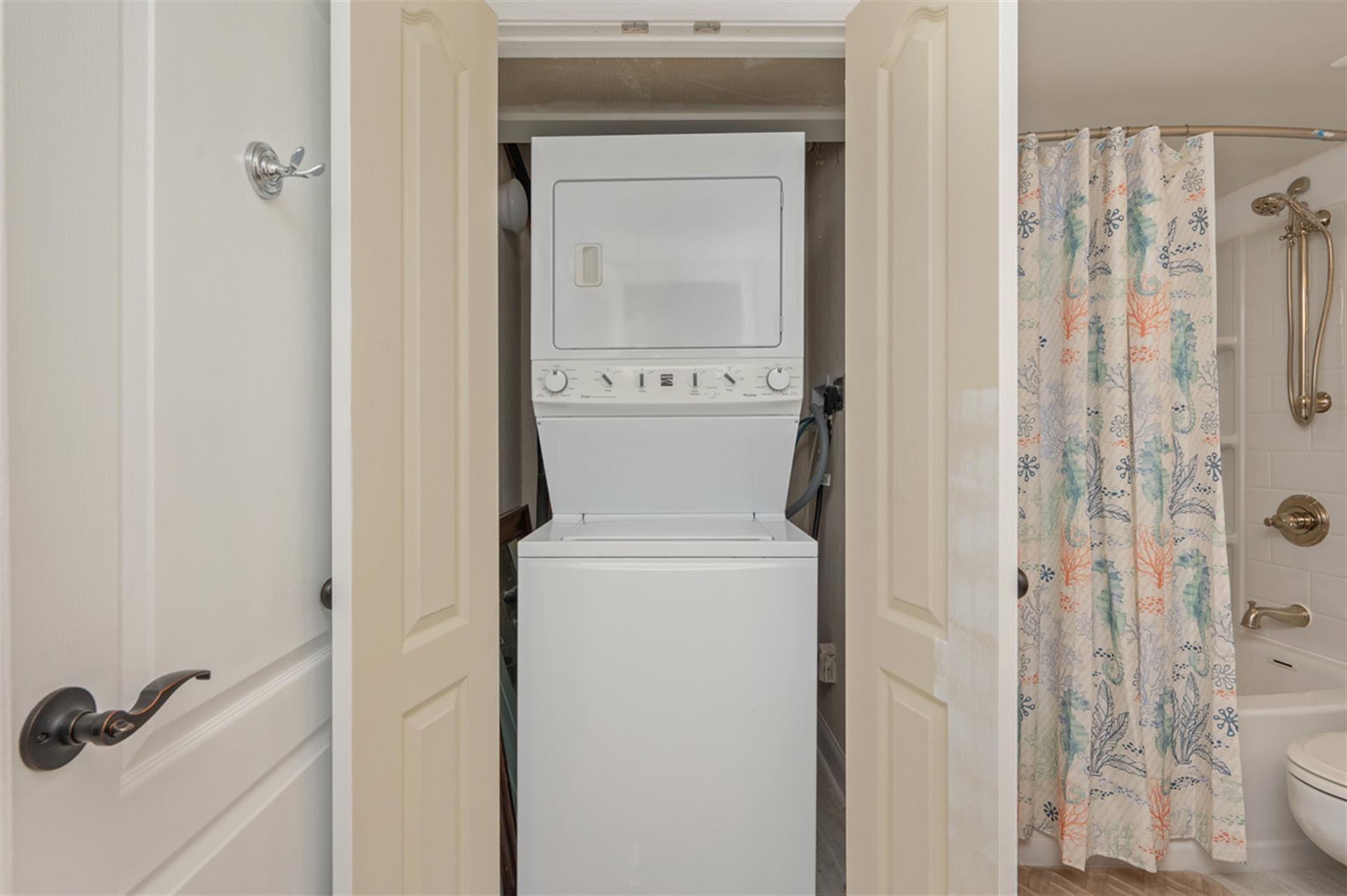 Your in-unit washer and dryer make extended stays effortless, tucked conveniently in this well-designed space.