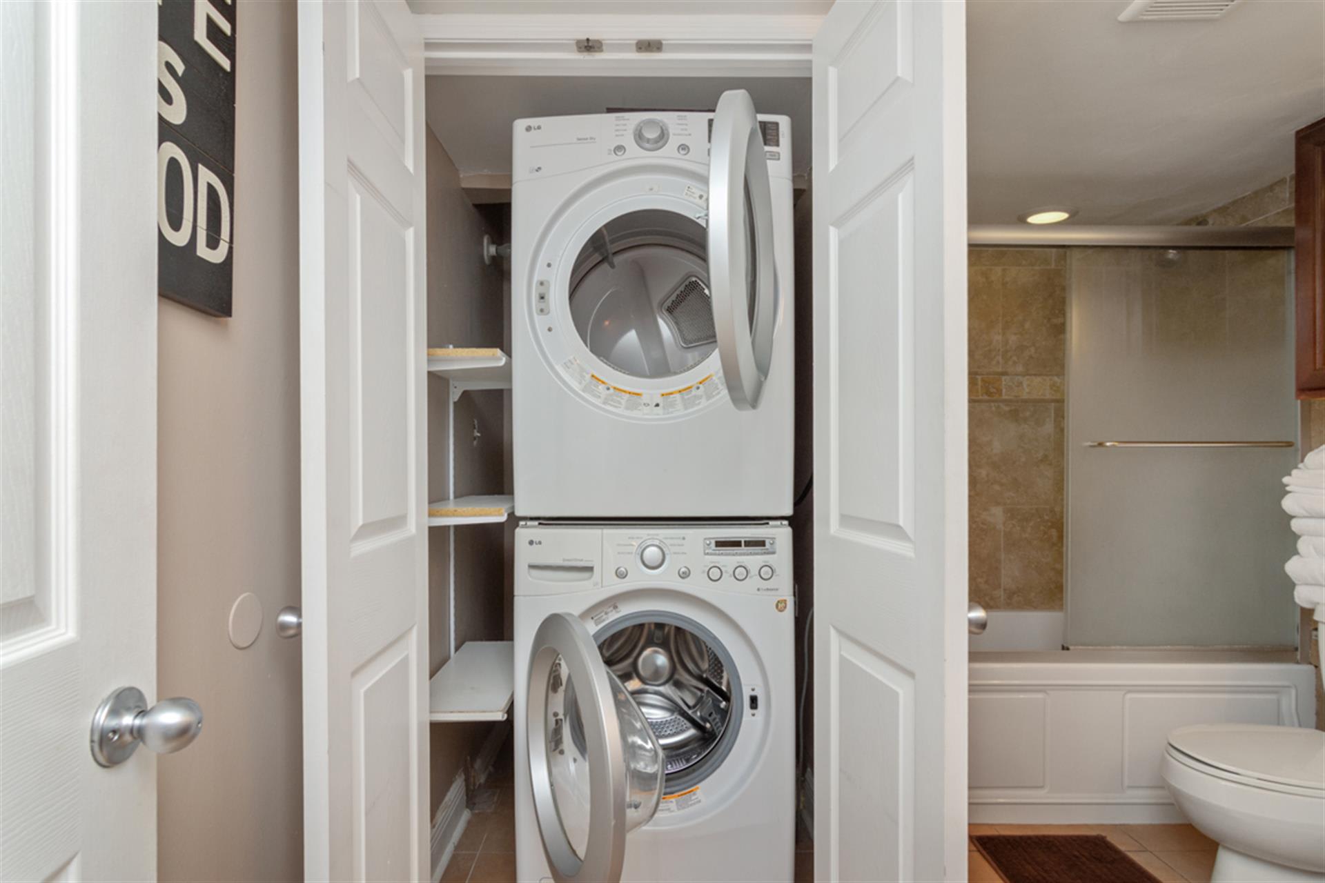 Your in-room laundry closet keeps you fresh and comfortable with stackable washer and dryer plus built-in shelving for supplies.