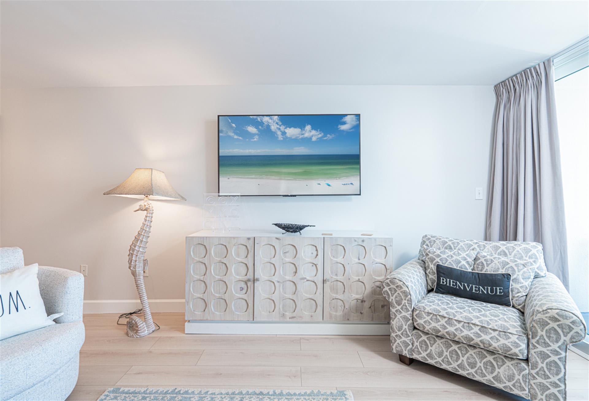 Sink into coastal comfort with beach-inspired décor and ocean artwork creating your perfect seaside retreat.
