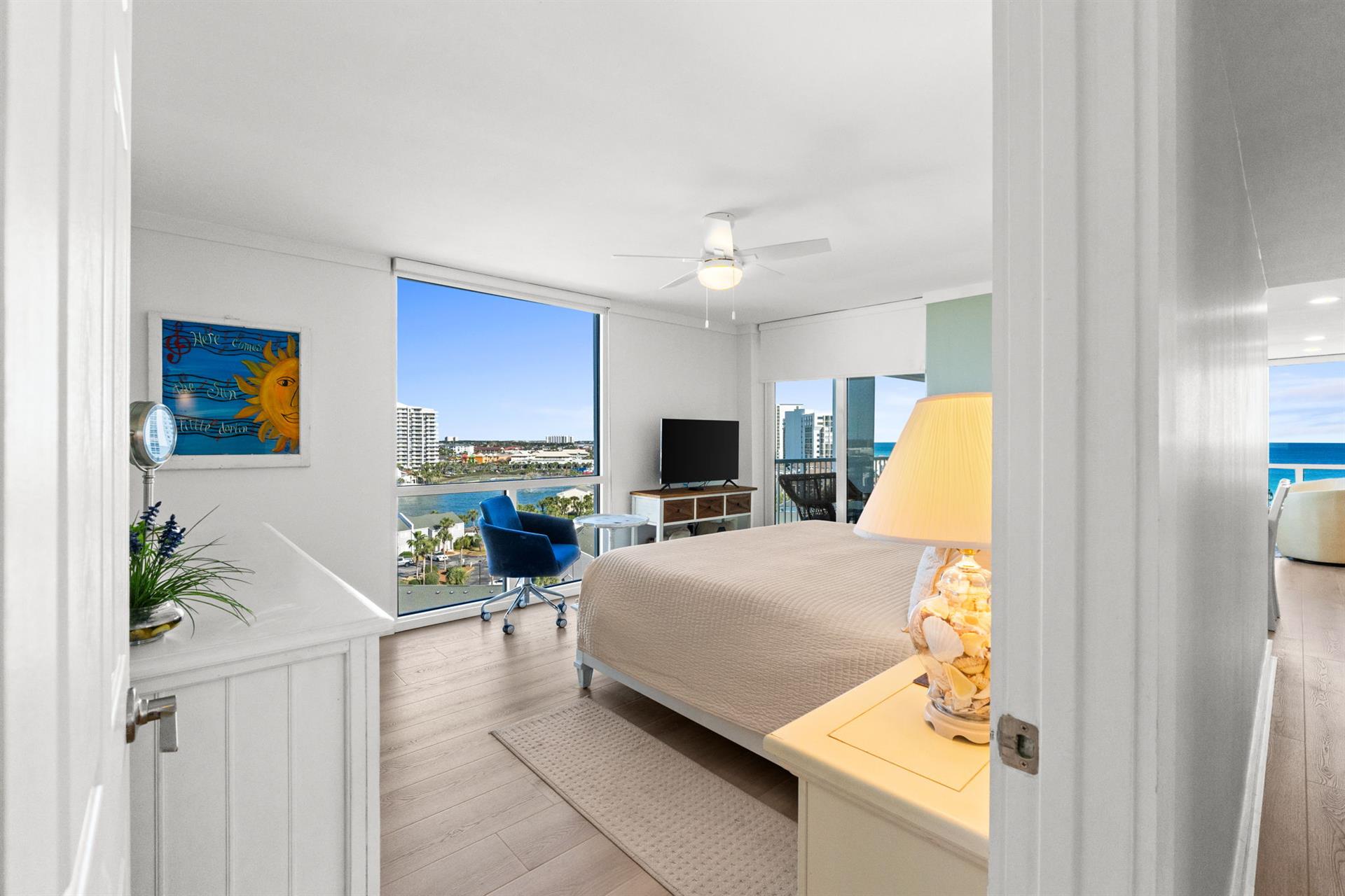 Wake up to stunning waterfront views from your comfortable bedroom with city skyline beyond your window.