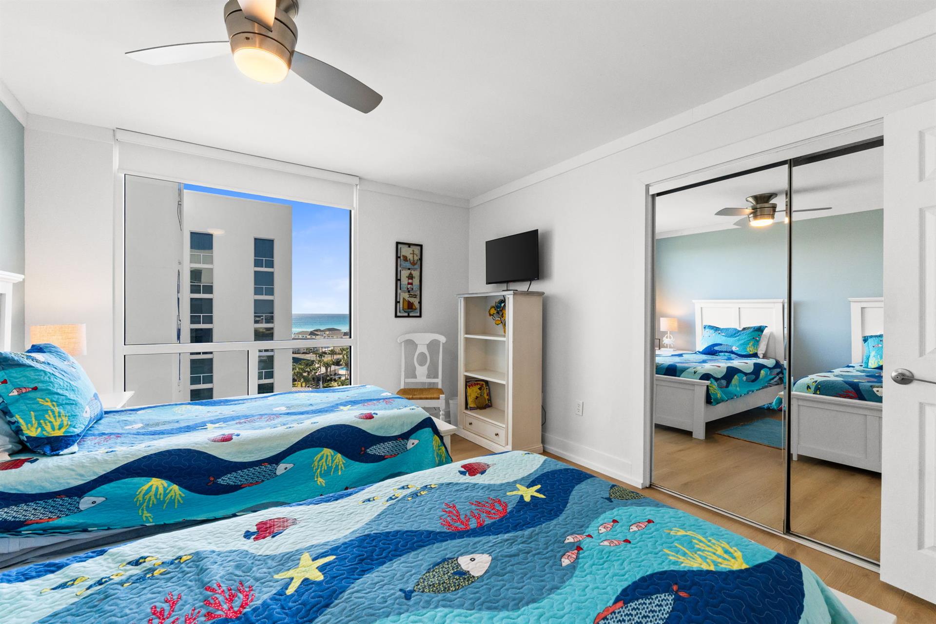 Your kids will drift off to sleep counting colorful fish on playful bedding while you enjoy ocean glimpses through the window.