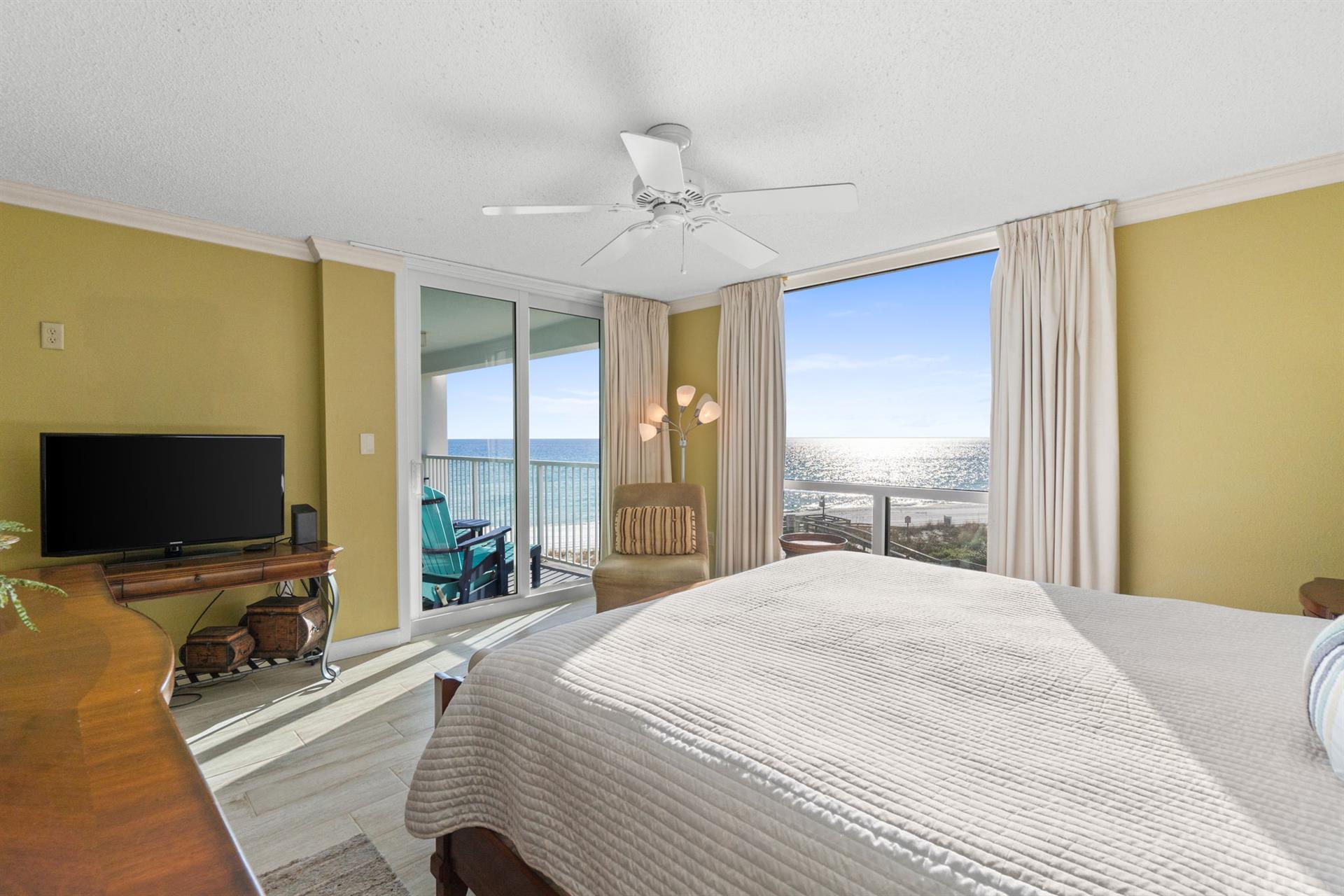 Wake up to stunning ocean views from your private balcony. Relax in comfort with a flat-screen TV and coastal breeze.