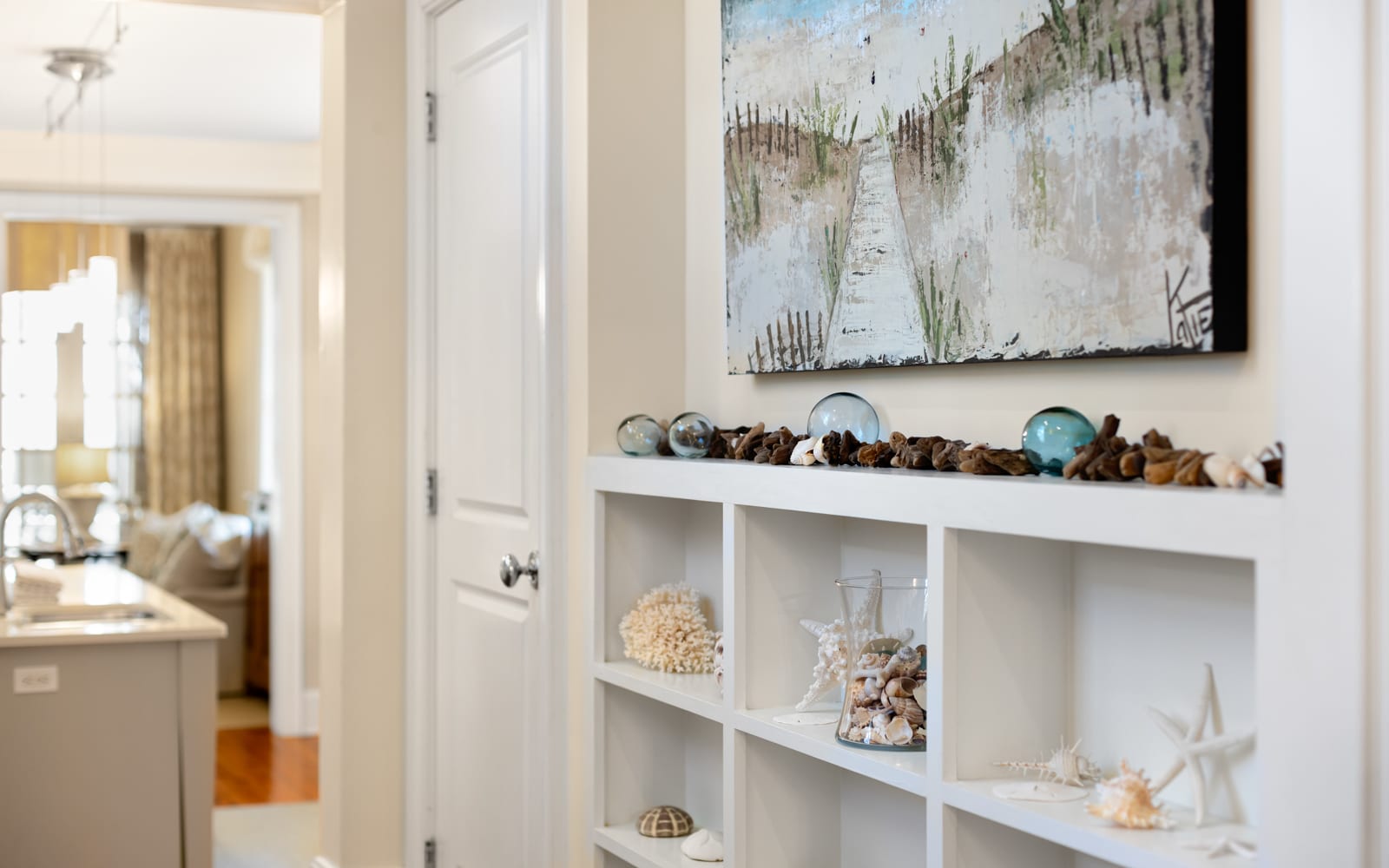 Admire coastal art and thoughtful touches while exploring your beautifully appointed space, where every detail invites relaxation.