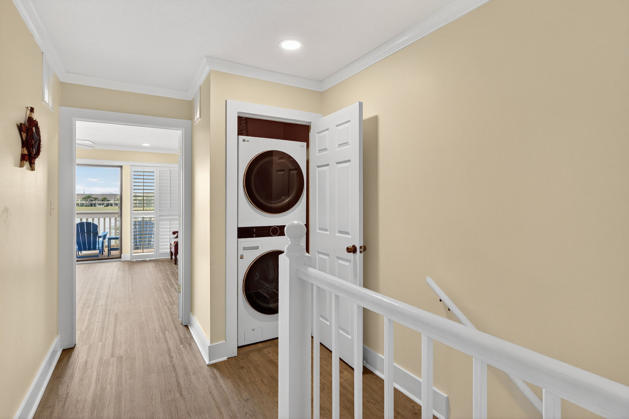 Convenient in-unit laundry with stacked washer and dryer tucked neatly into your hallway closet, making it easy to keep your vacation wardrobe fresh.