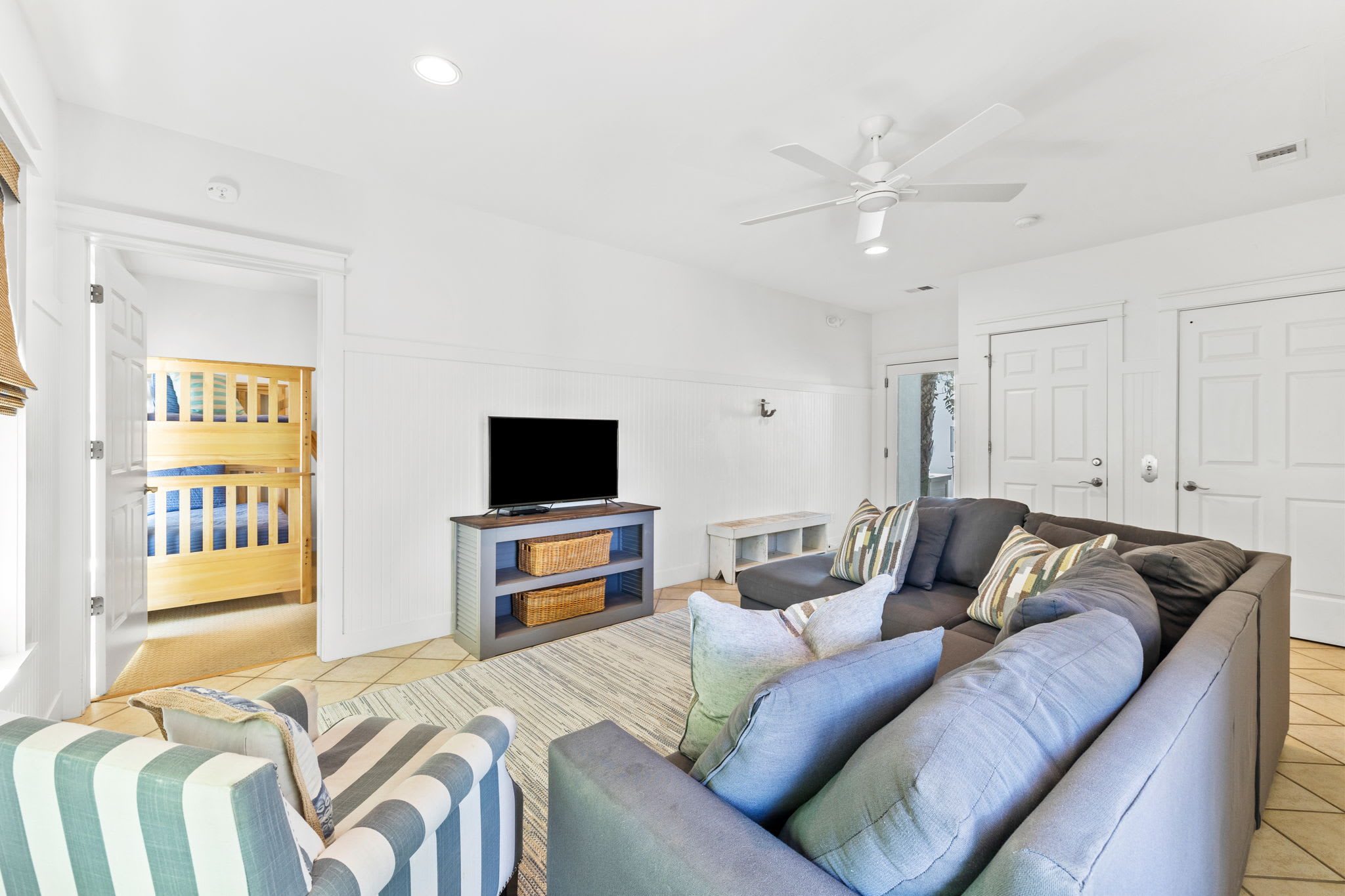 First Floor Living Area - Equipped with a Large Flat Screen TV