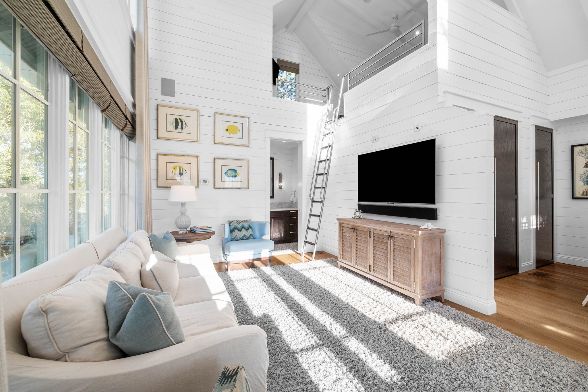 Carriage House Living Room - Equipped with Three Flat Screen TVs