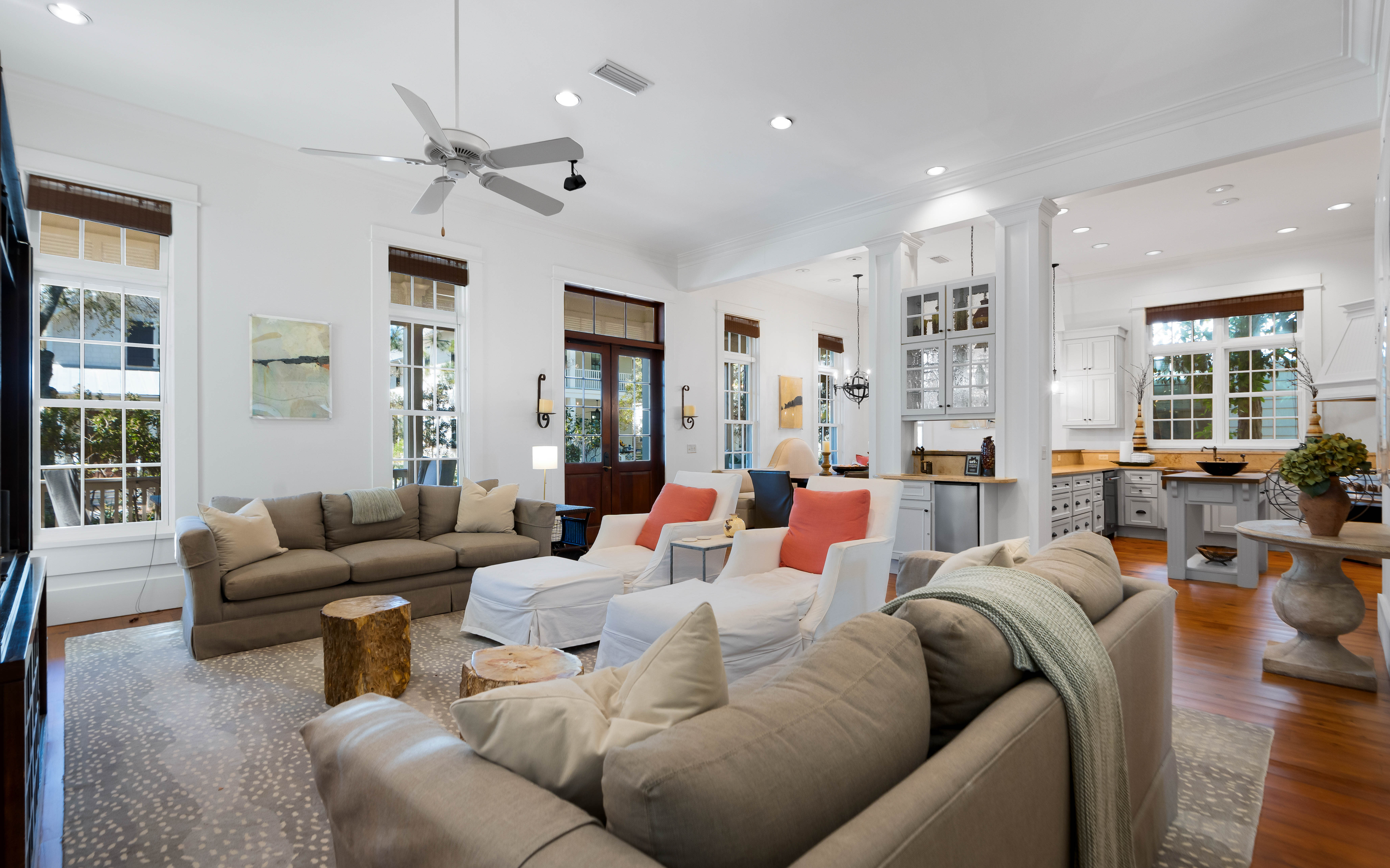 Relax in this bright, airy living space where plush sofas and open-concept design create the perfect gathering spot for your group.